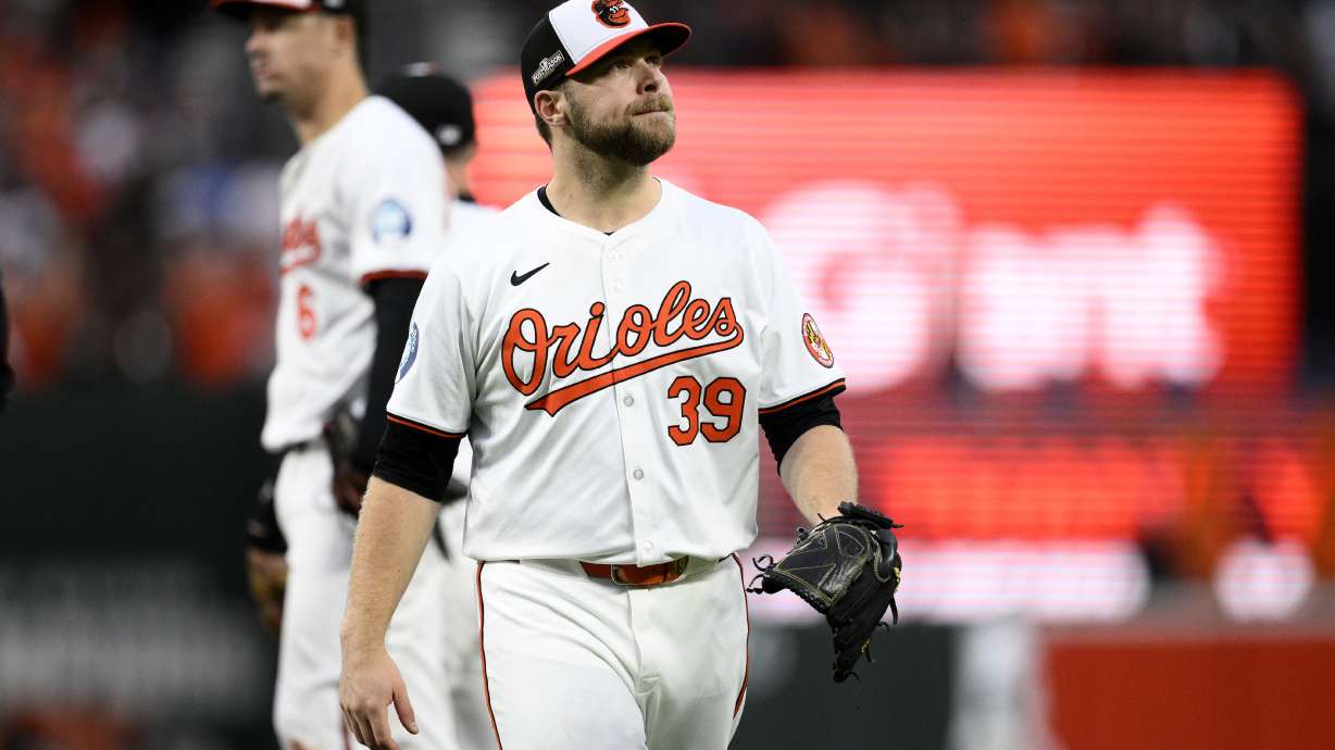 Baltimore Orioles starting pitcher Corbin Burnes (39) walks back to the dugout after he was removed in the ninth inning during Game 1 of an AL Wild Card Series baseball game against the Kansas City Royals, Tuesday, Oct. 1, 2024, in Baltimore. The Royals won 1-0.