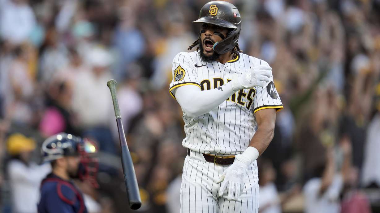 San Diego Padres' Fernando Tatis Jr. tosses his bat after hitting a two-run home run during the first inning in Game 1 of an NL Wild Card Series baseball game against the Atlanta Braves, Tuesday, Oct. 1, 2024, in San Diego.