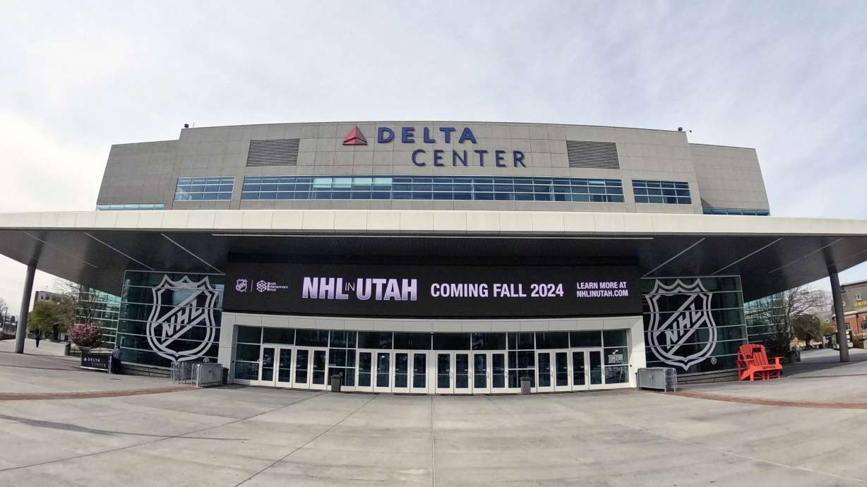 FILE - Signs celebrating the awarding of a new NHL team to Utah are shown at the Delta Center Friday, April 19, 2024, in Salt Lake City.