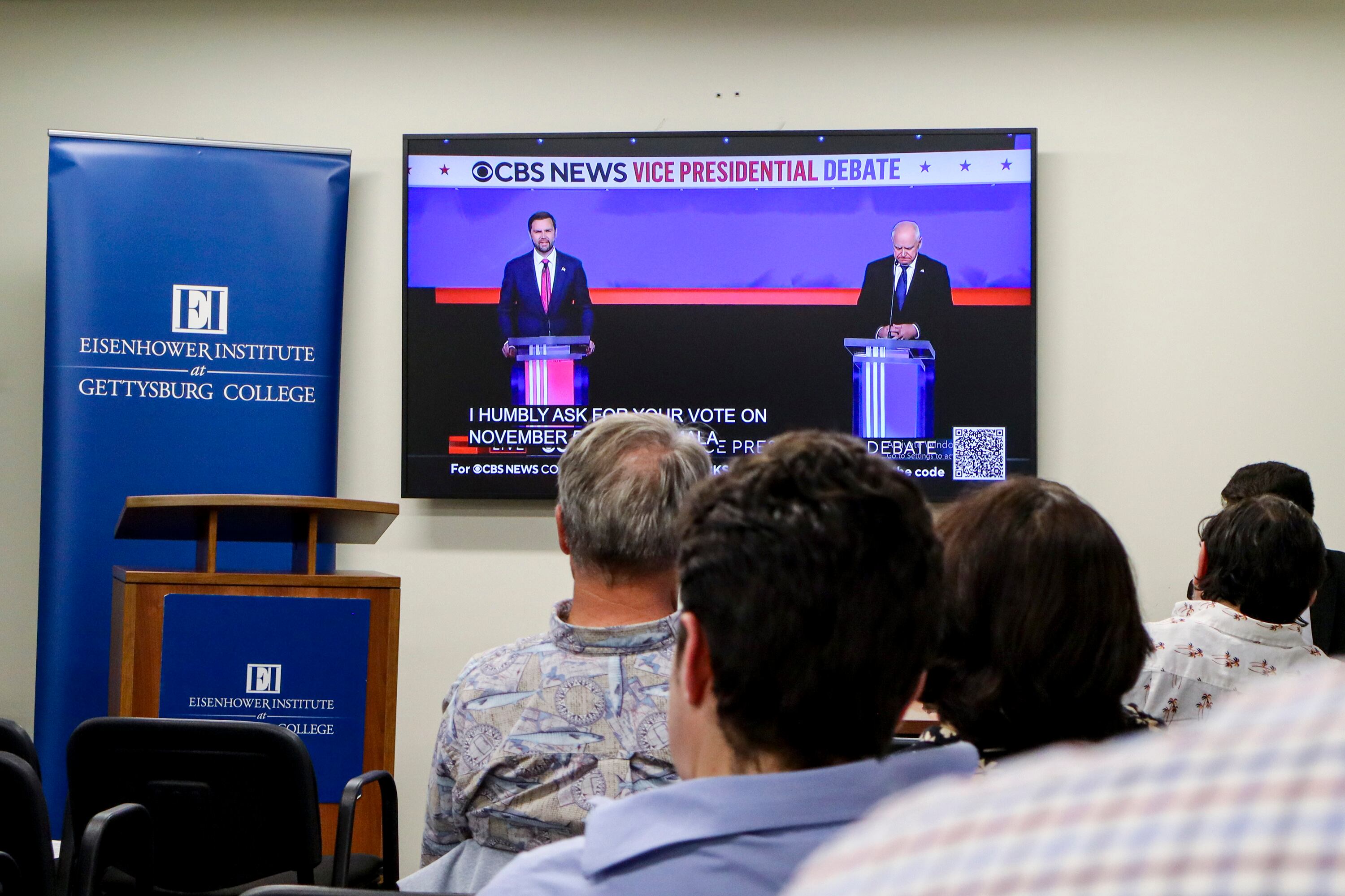 Attendees at the Braver Angels' “Red-Blue Vice-Presidential Debate Watch Party" view a CBS livestream in Washington, D.C., on Tuesday.