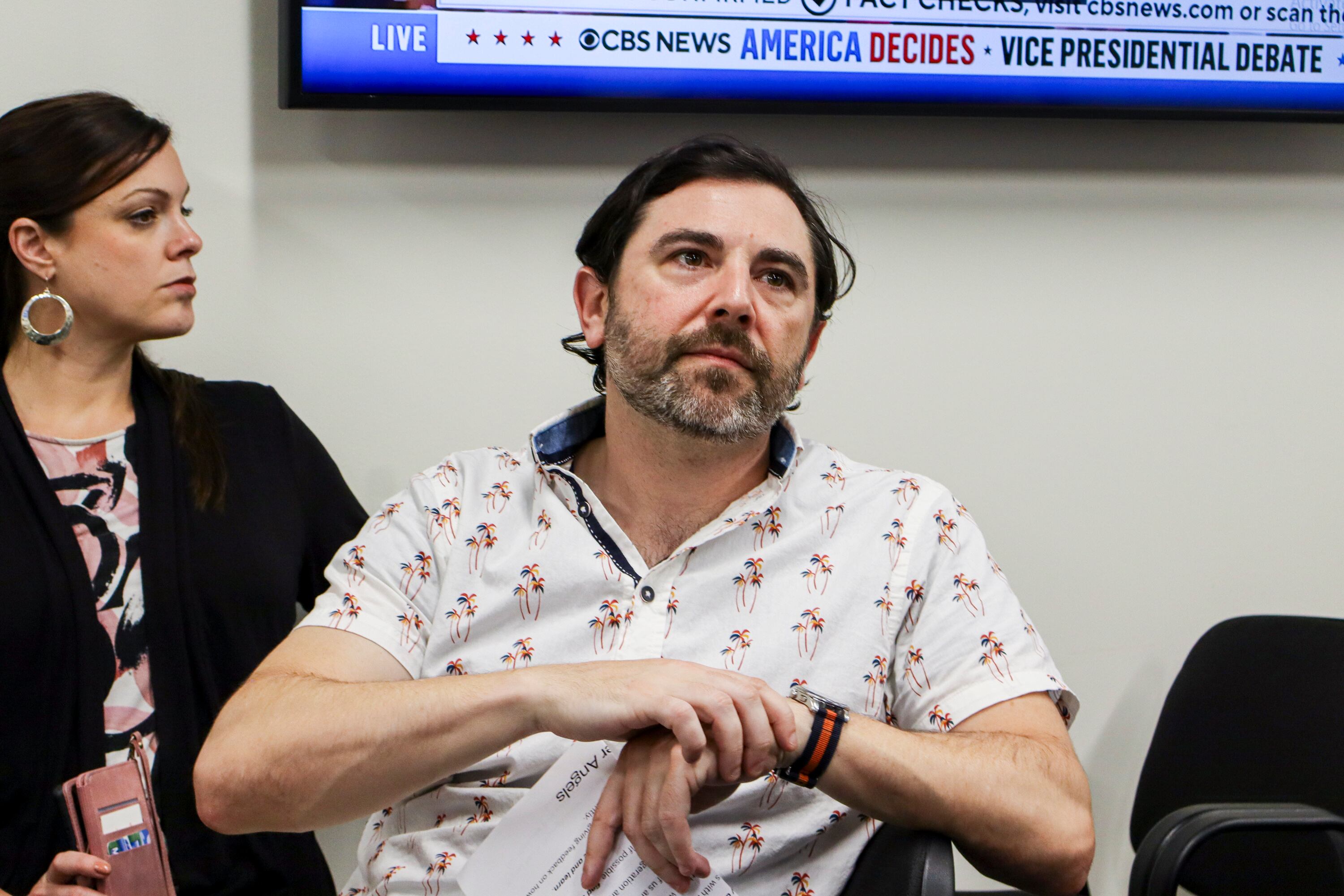 Randy Lioz listens to a discussion about the vice presidential debate during the Braver Angels' “Red-Blue Vice-Presidential Debate Watch Party" in Washington, D.C., on Tuesday.