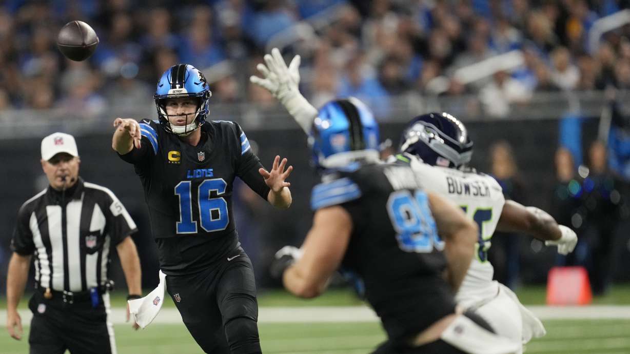 Detroit Lions quarterback Jared Goff (16) passes during the first half of an NFL football game against the Seattle Seahawks, Monday, Sept. 30, 2024, in Detroit.