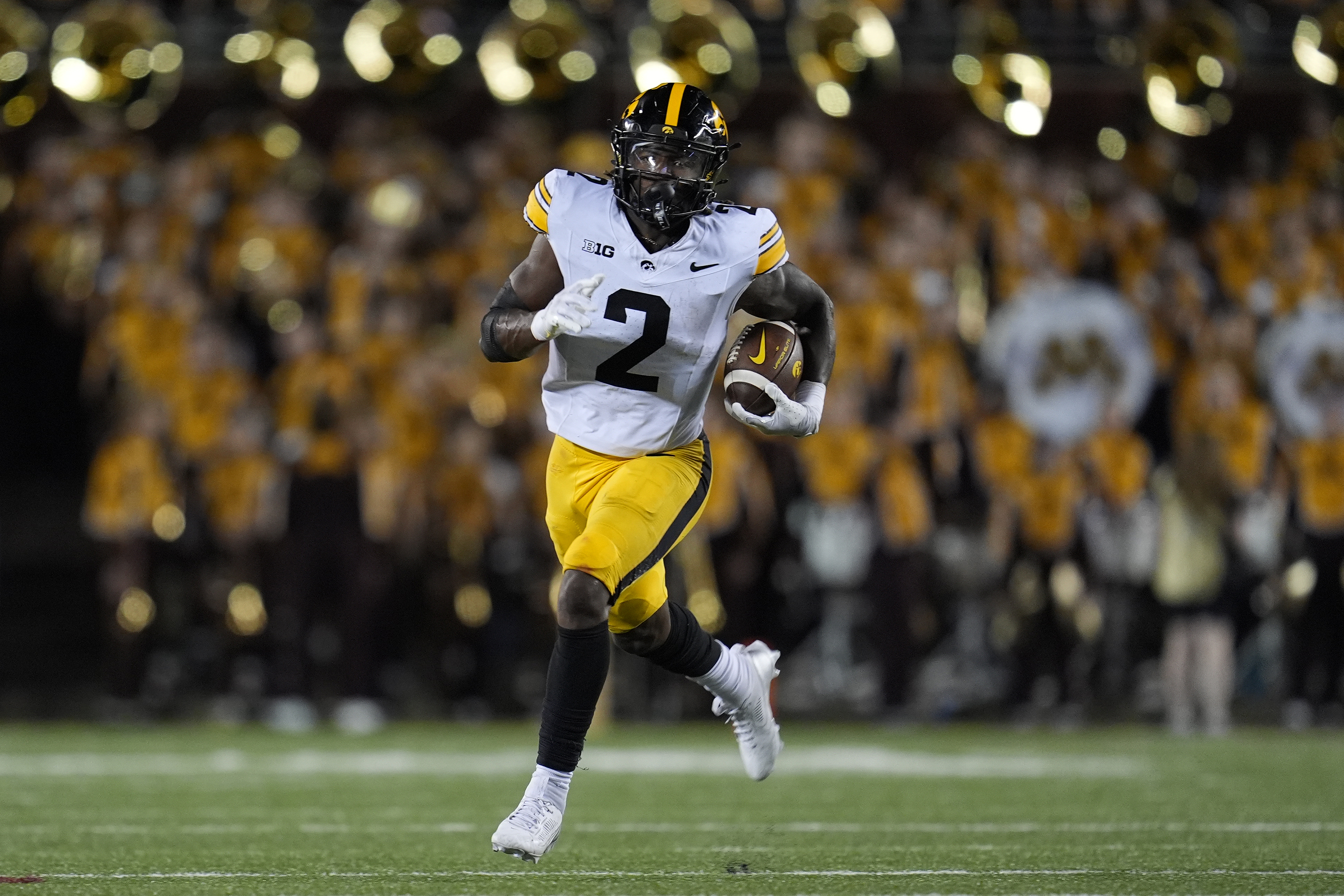 Iowa running back Kaleb Johnson runs with the ball during the second half of an NCAA college football game against Minnesota, Saturday, Sept. 21, 2024, in Minneapolis. 