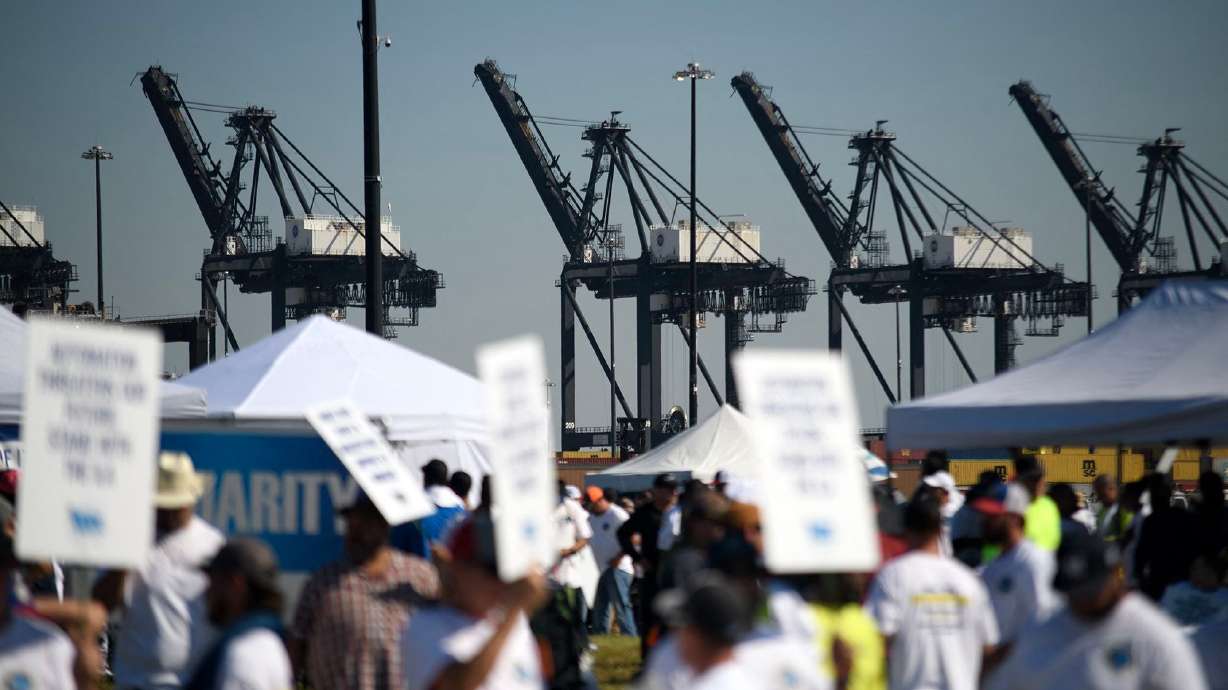 Dockworkers strike at the Bayport Container Terminal in Seabrook, Texas on Wednesday. A lack of toilet paper isn't a direct result of a major port strike. It's because of panic buying.