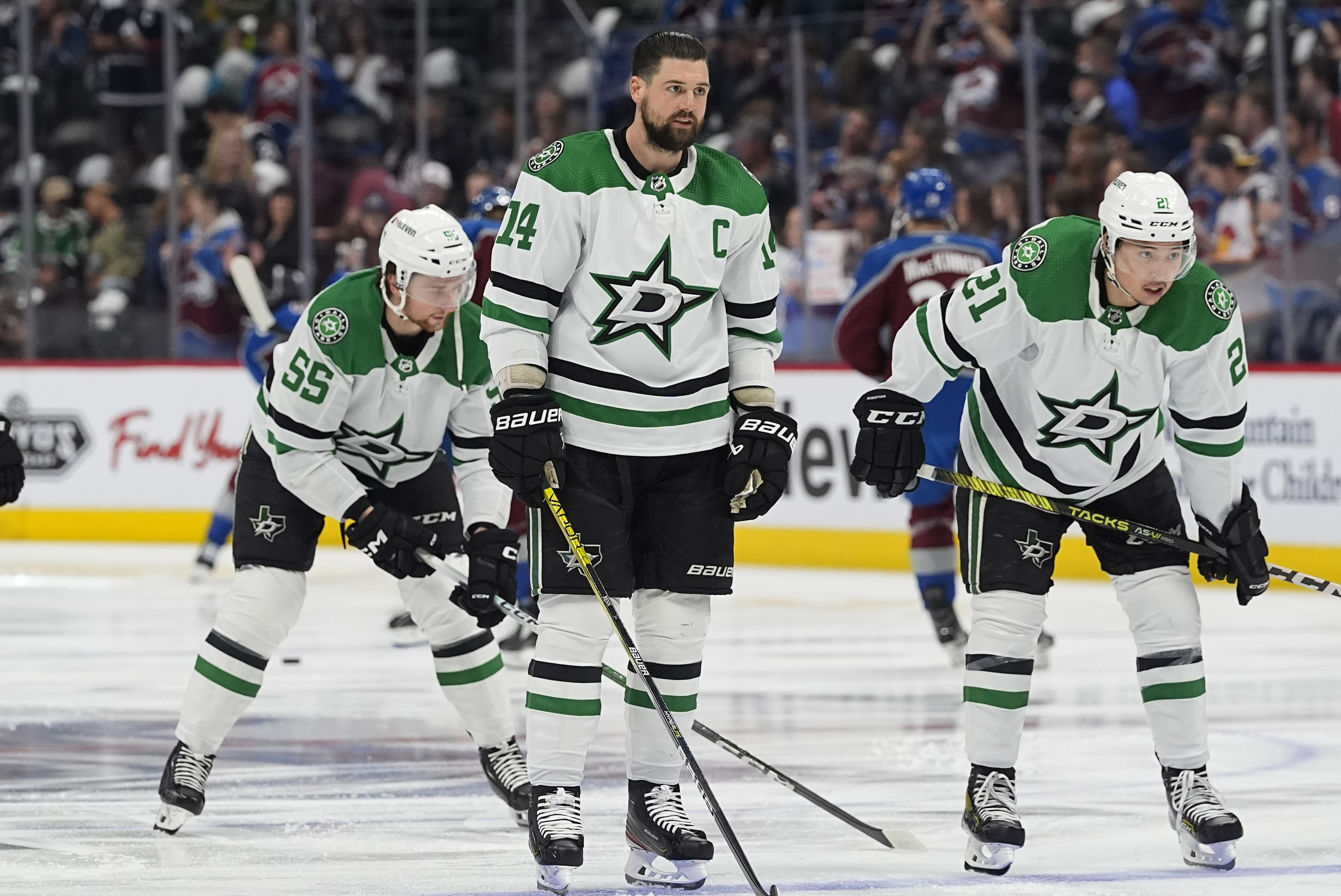 FILE - Dallas Stars left wings Jamie Benn, front left, and Jason Robertson warm up before Game 6 of the team's NHL hockey playoff series against the Colorado Avalanche on Friday, May 17, 2024, in Denver.