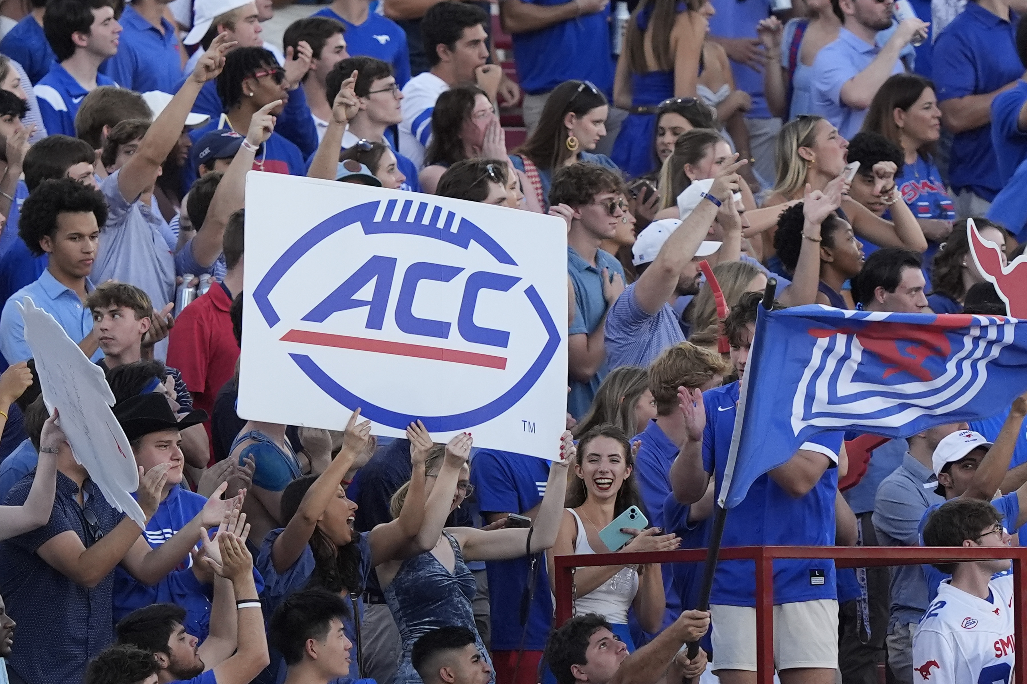 Fans in the SMU student section hold up a sign during the first half of an NCAA college football game against Florida State, Saturday, Sept. 28, 2024, in Dallas. 