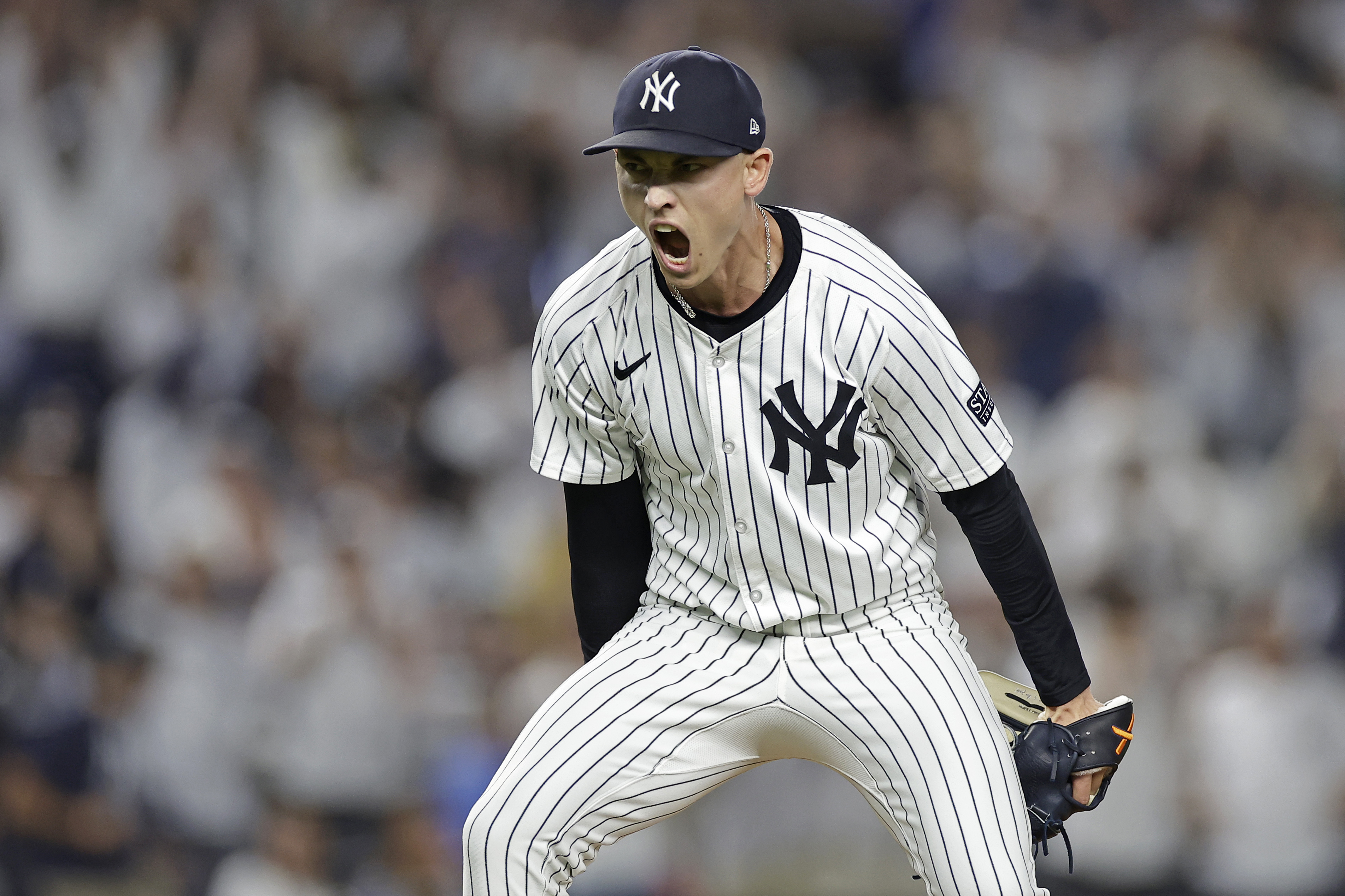 New York Yankees relief pitcher Luke Weaver reacts after the final out of a baseball game against the Boston Red Sox Friday, Sept. 13, 2024, in New York. 