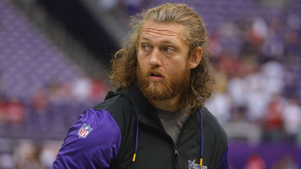 Minnesota Vikings tight end T.J. Hockenson walks on the field before an NFL football game against the San Francisco 49ers, Sunday, Sept. 15, 2024, in Minneapolis.