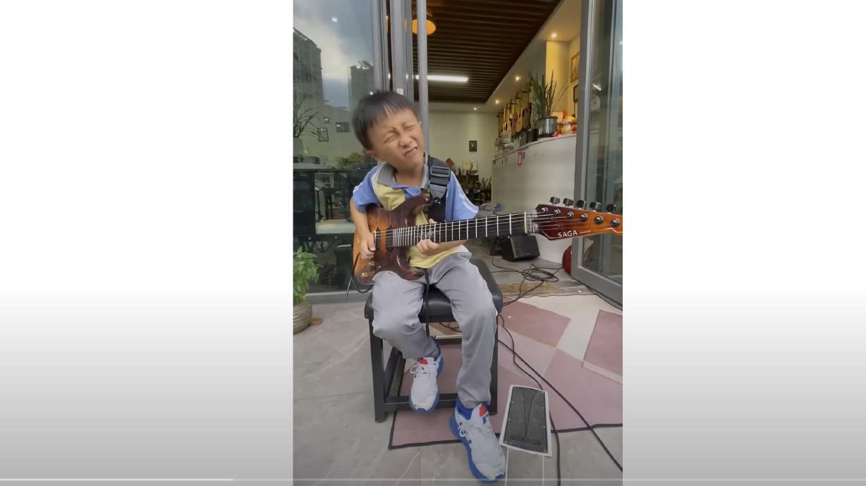 Maituo, 9, plays the blues in this YouTube video.