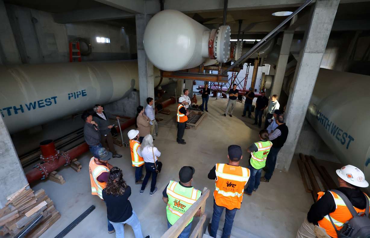 People tour a new pump station that is part of an $81 million seismic resilience project for the Davis Aqueduct, to increase water security in the event of a major earthquake, in South Weber on Wednesday.