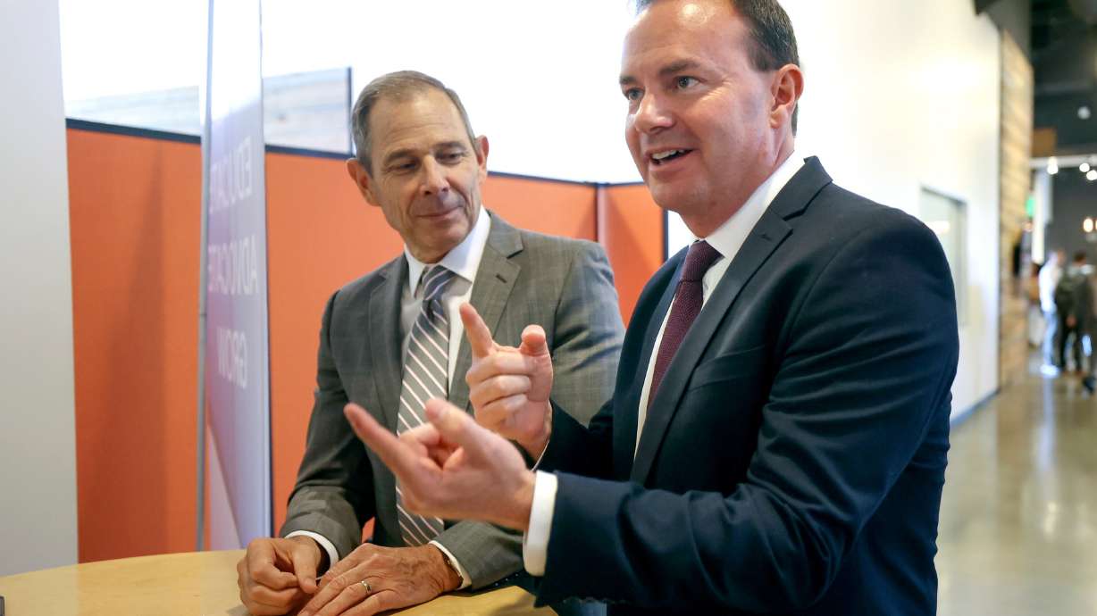Rep. John Curtis, R-Utah, and Sen. Mike Lee, R-Utah, at Salt Mine Productive in Sandy on Aug. 18, 2022. Lee and Curtis are at the center of the Republican debate about who will lead their expected Senate majority in 2025.