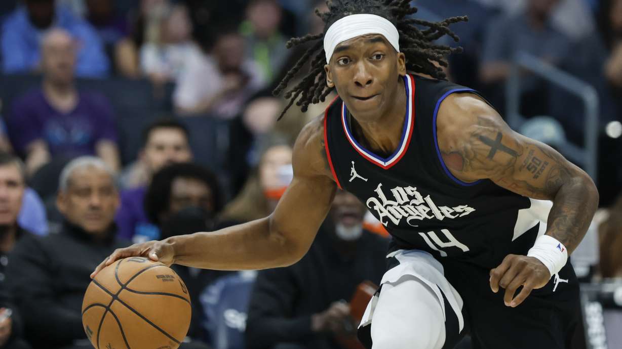 FILE - Los Angeles Clippers guard Terance Mann drives to the basket during the first half of an NBA basketball game against the Charlotte Hornets in Charlotte, N.C., Sunday, March 31, 2024.