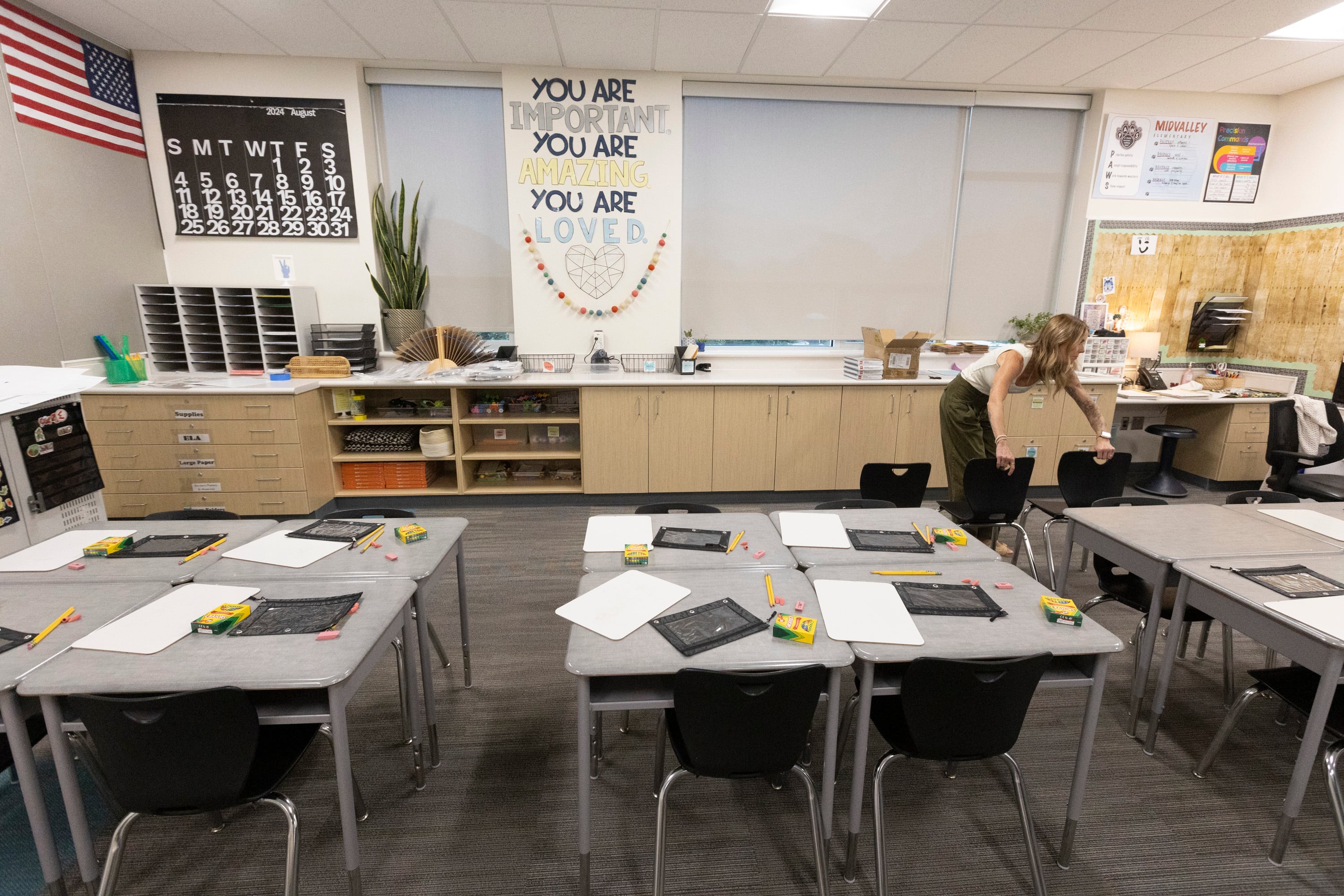 Third-grade teacher Jen Stark prepares her classroom for the first day of school at Midvalley Elementary School in Midvale on Aug. 12. The country's largest teachers union is coming after Amendment A  in a big way.