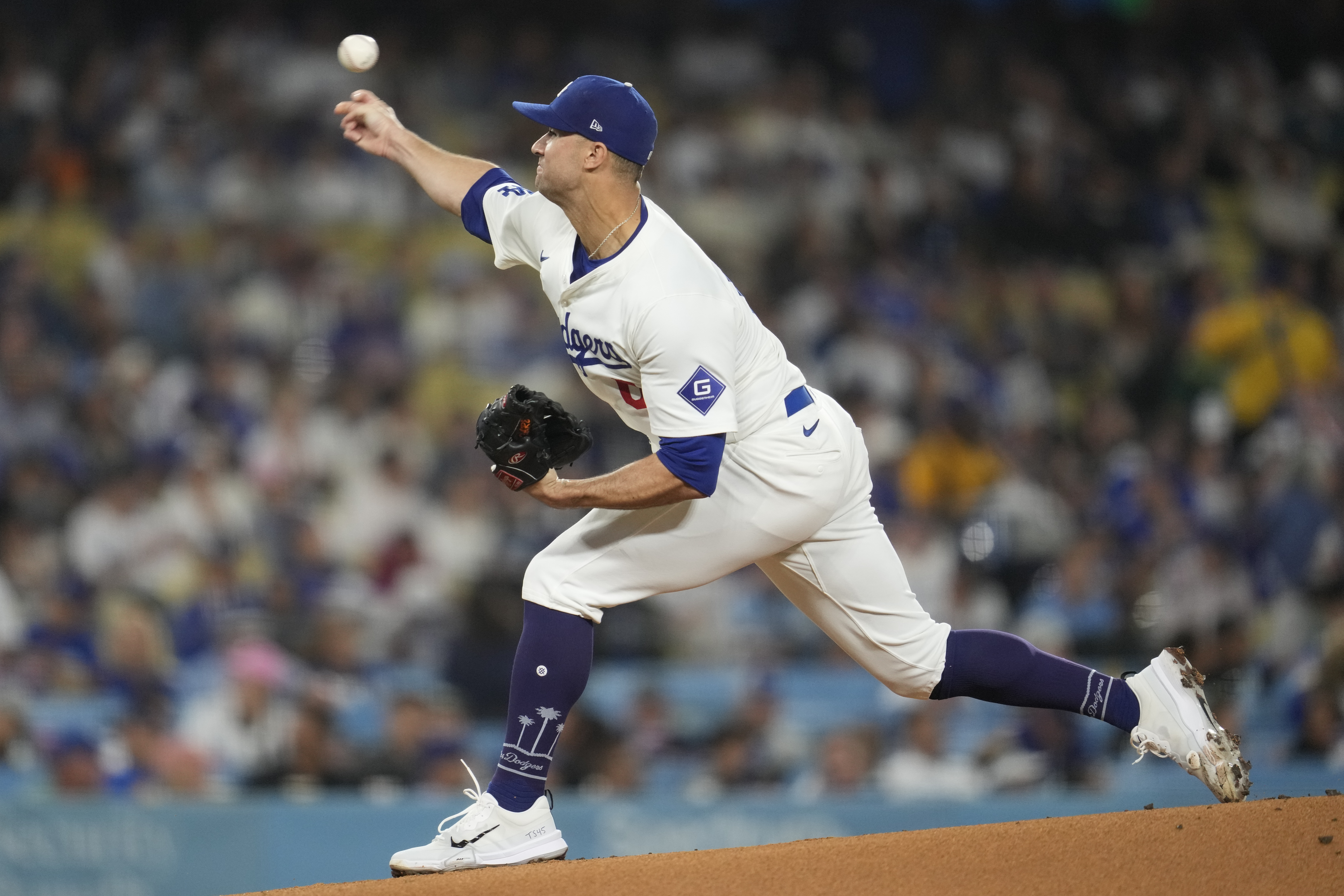 Los Angeles Dodgers starting pitcher Jack Flaherty throws during the first inning of a baseball game against the San Diego Padres in Los Angeles, Wednesday, Sept. 25, 2024. 