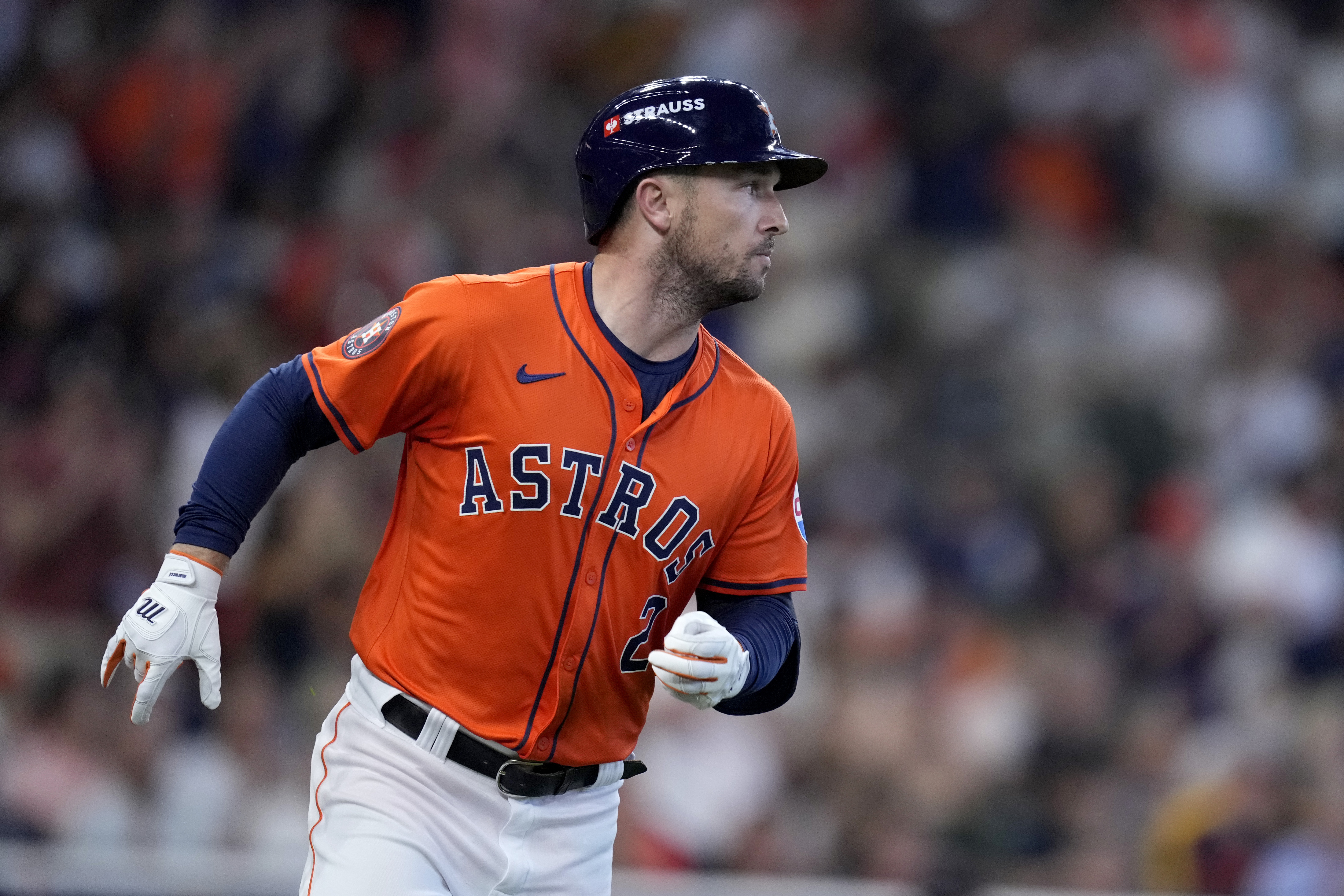 Houston Astros' Alex Bregman sprints to first after hitting for a single against the Detroit Tigers in the second inning of Game 2 of an AL Wild Card Series baseball game Wednesday, Oct. 2, 2024, in Houston. 