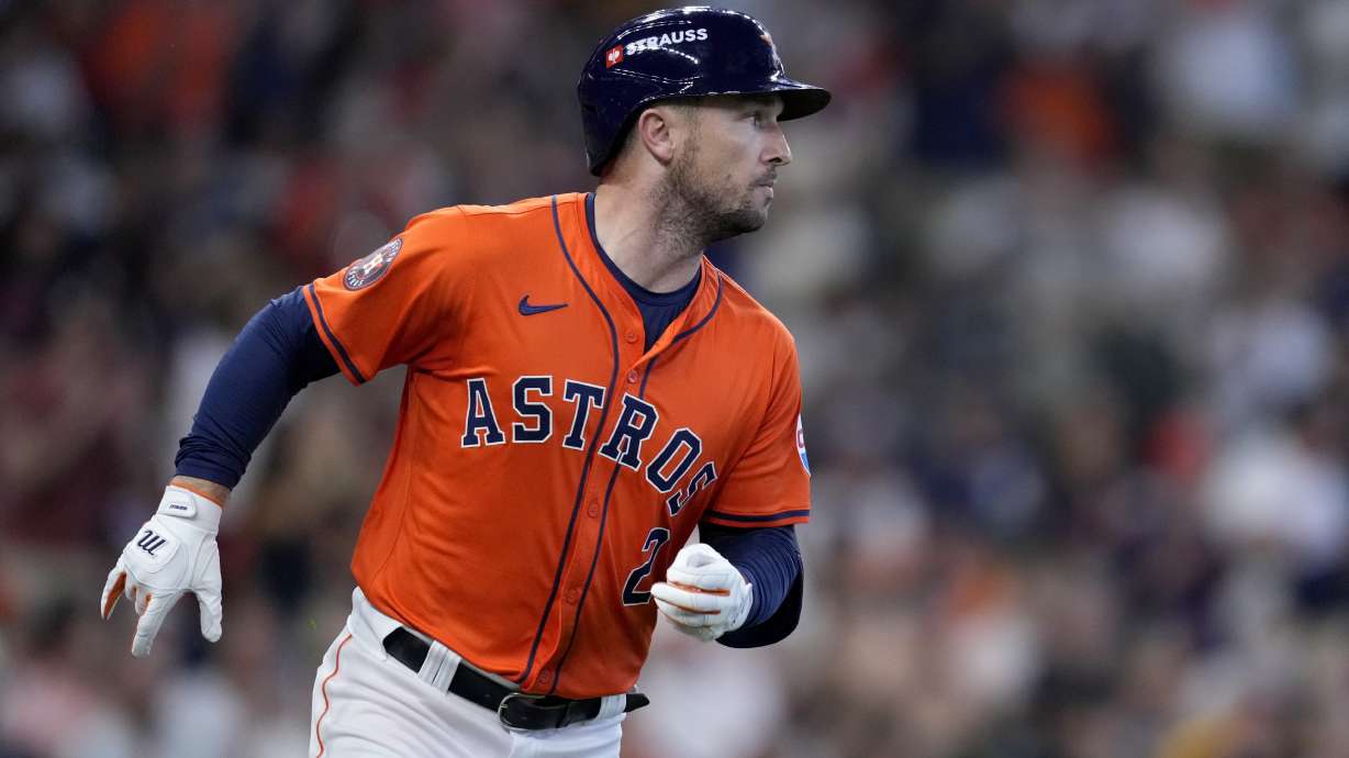 Houston Astros' Alex Bregman sprints to first after hitting for a single against the Detroit Tigers in the second inning of Game 2 of an AL Wild Card Series baseball game Wednesday, Oct. 2, 2024, in Houston.