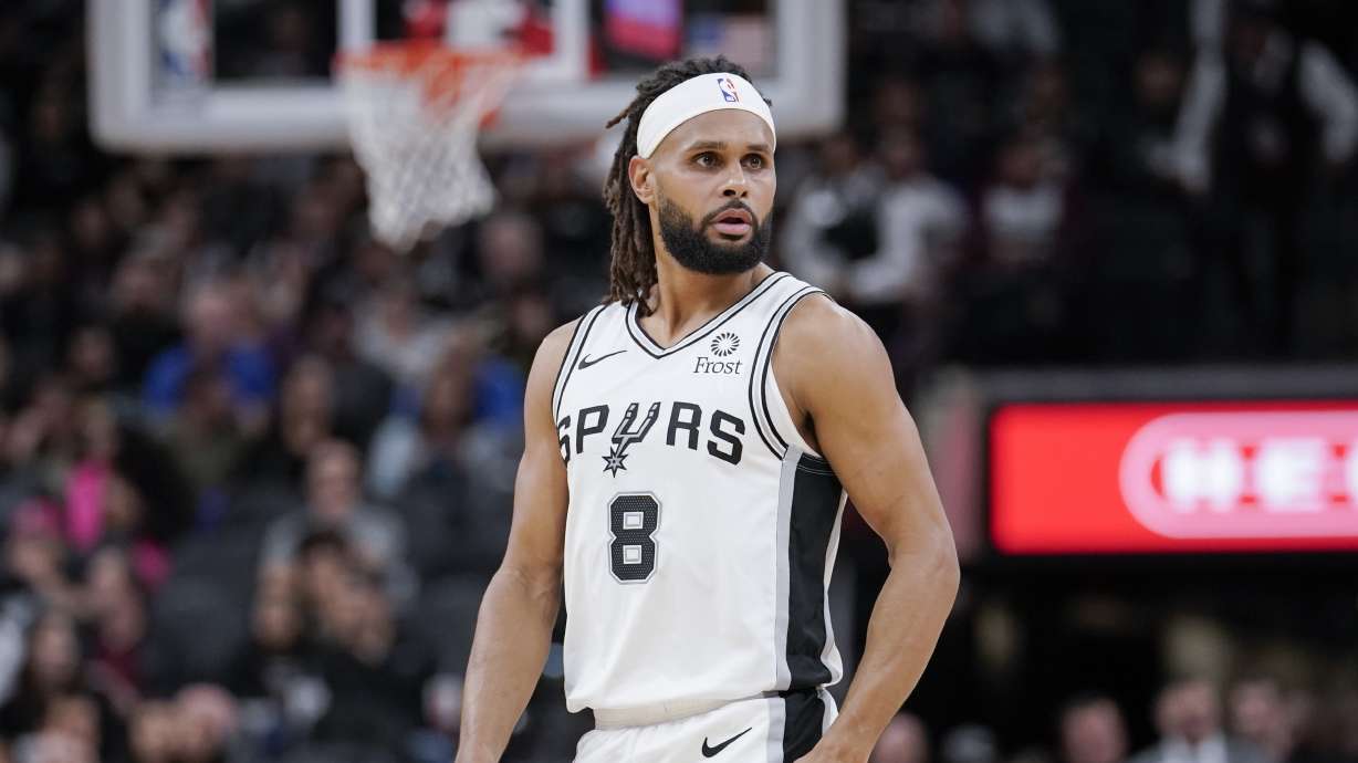 San Antonio Spurs guard Patty Mills walks upcourt during the first half of an NBA basketball game against the Oklahoma City Thunder, Thursday, Nov. 7, 2019, in San Antonio. San Antonio won 121-112.