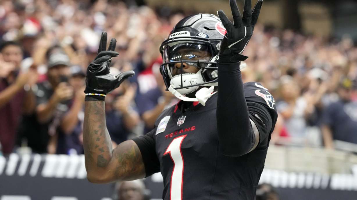 Houston Texans wide receiver Stefon Diggs (1) celebrates after a 6-yard touchdown run during the first half of an NFL football game against the Jacksonville Jaguars, Sunday, Sept. 29, 2024, in Houston.
