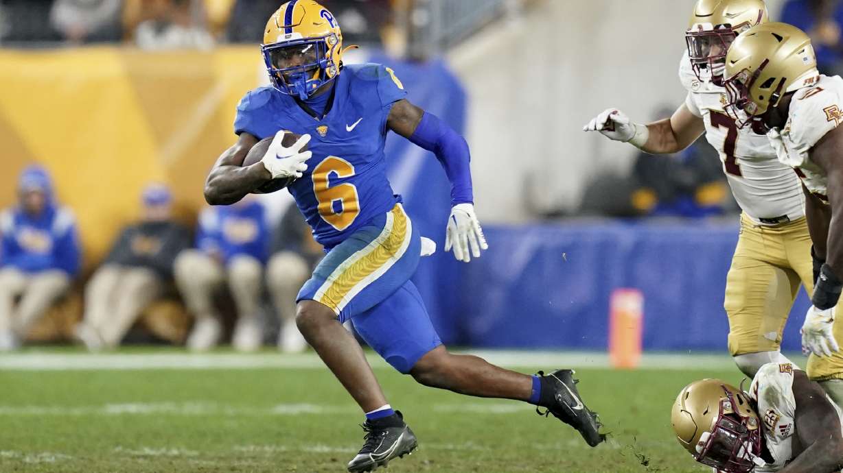 FILE - Pittsburgh running back Rodney Hammond Jr. (6) carries for a first down during the second half of an NCAA college football game against Boston College, Nov. 16, 2023, in Pittsburgh.