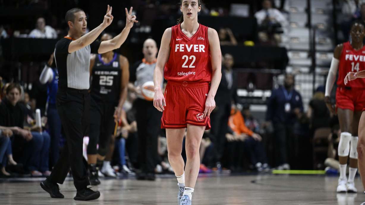 Indiana Fever guard Caitlin Clark (22) receives a delay of game warning during the second half of Game 2 of a first-round WNBA basketball playoff series agains the Connecticut Sun, Wednesday, Sept. 25, 2024, in Uncasville, Conn.