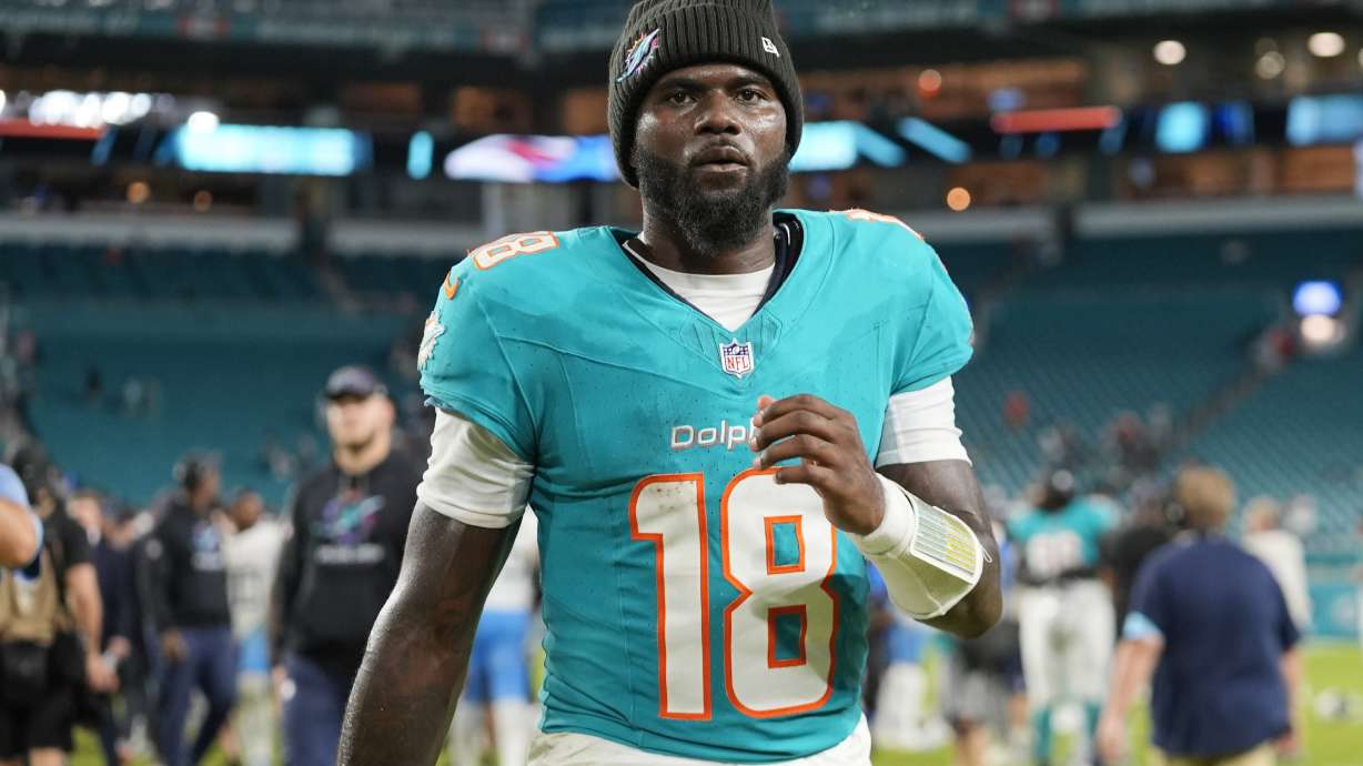 Miami Dolphins quarterback Tyler Huntley (18) exist the field at the end of an NFL football game against the Tennessee Titans, Monday, Sept. 30, 2024, in Miami Gardens, Fla.