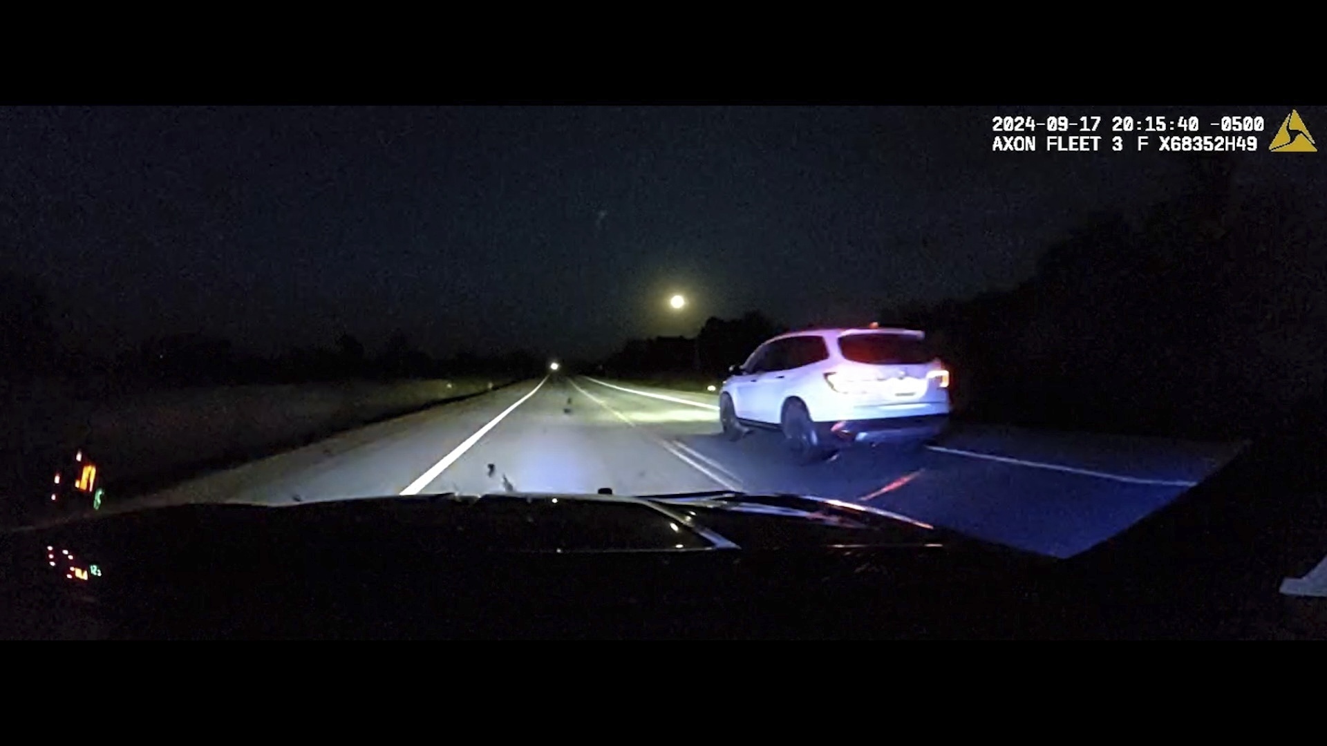 This image shows a Minnesota trooper passing an 18-year-old after the Honda Pilot he was driving began to accelerate over 100 miles per hour in western Minnesota on Sept. 17.