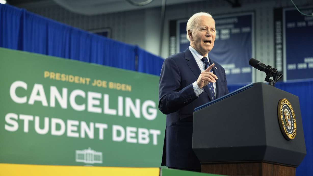 President Joe Biden speaks about student loan debt, April 8, in Madison, Wis. Biden's latest attempt at student loan cancellation is free to move ahead, at least temporarily, a judge ruled Thursday.