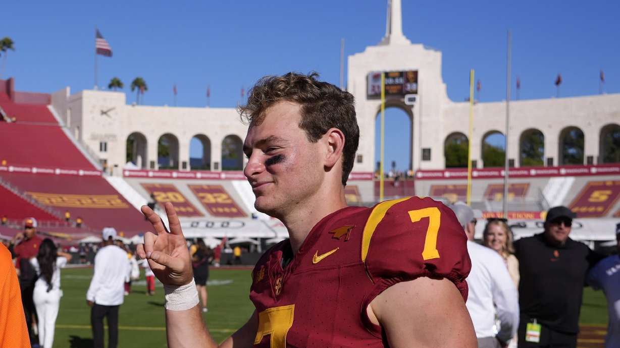 Southern California quarterback Miller Moss gestures as he walks off the field after USC defeated Wisconsin 38-21 in an NCAA college football game, Saturday, Sept. 28, 2024, in Los Angeles.