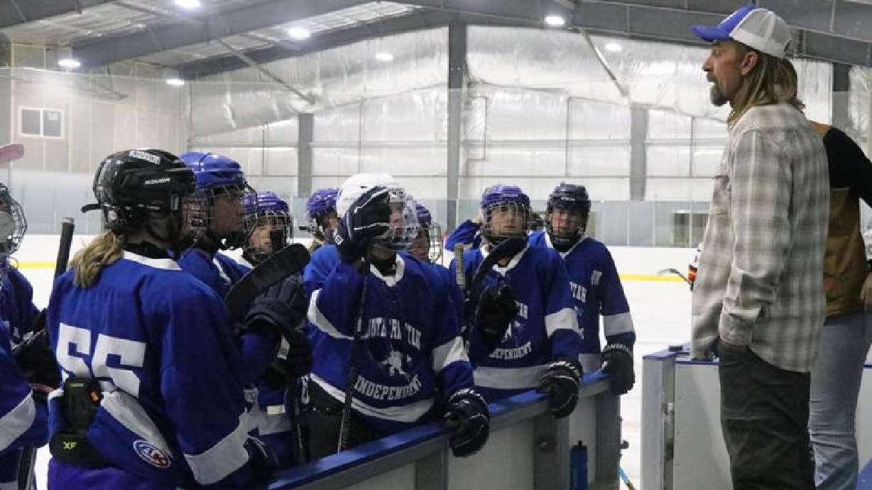 Southern Utah Independent hockey coach Chad Fain talks to his players before their game versus the Tooele Outlaws in the new KJ's Ice Barn arena, Enoch, Sept. 27.