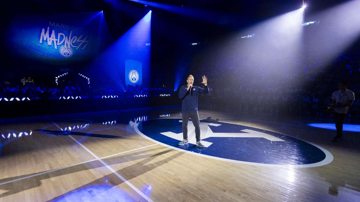 Brigham Young Cougars head coach Kevin Young talks to fans and students during Marriott Madness at the Marriott Center on the campus of Brigham Young University in Provo on Thursday, Oct. 3, 2024.