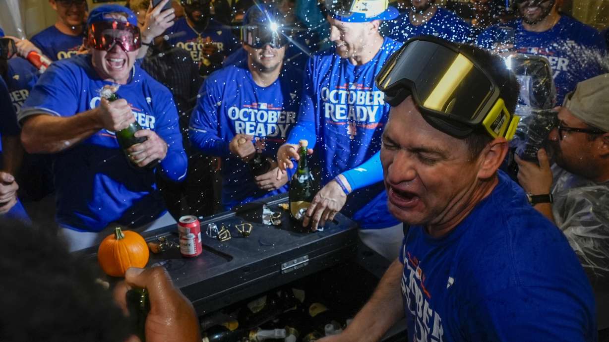 The New York Mets celebrate after winning Game 3 of a National League wild card baseball game against the Milwaukee Brewers Thursday, Oct. 3, 2024, in Milwaukee. The Mets won 4-2.
