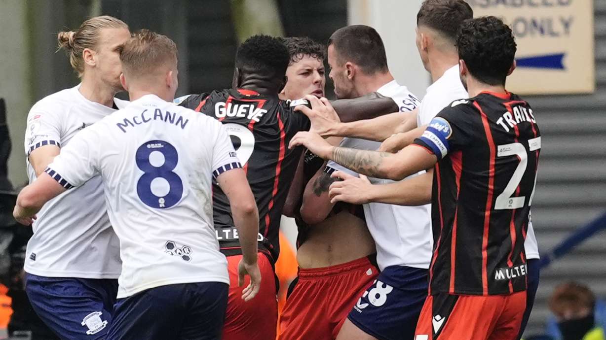 Blackburn Rovers' Owen Beck is confronted by Preston North End's Milutin Osmajic before being shown a red card, during an English Football League soccer match, at Deepdale, in Preston, England, Sunday, Sept. 22, 2024.