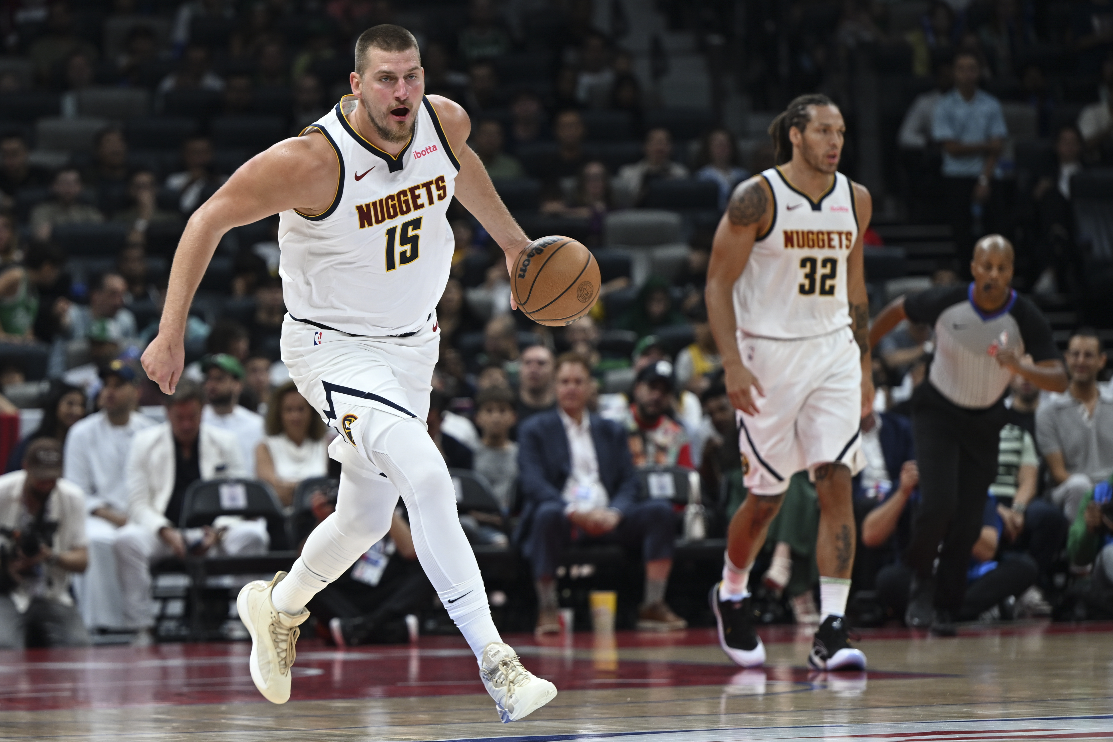 Denver Nuggets Nikola Jokic in action during a preseason game between Boston Celtics and Denver Nuggets in Abu Dhabi, United Arab Emirates, Friday, Oct. 4, 2024.