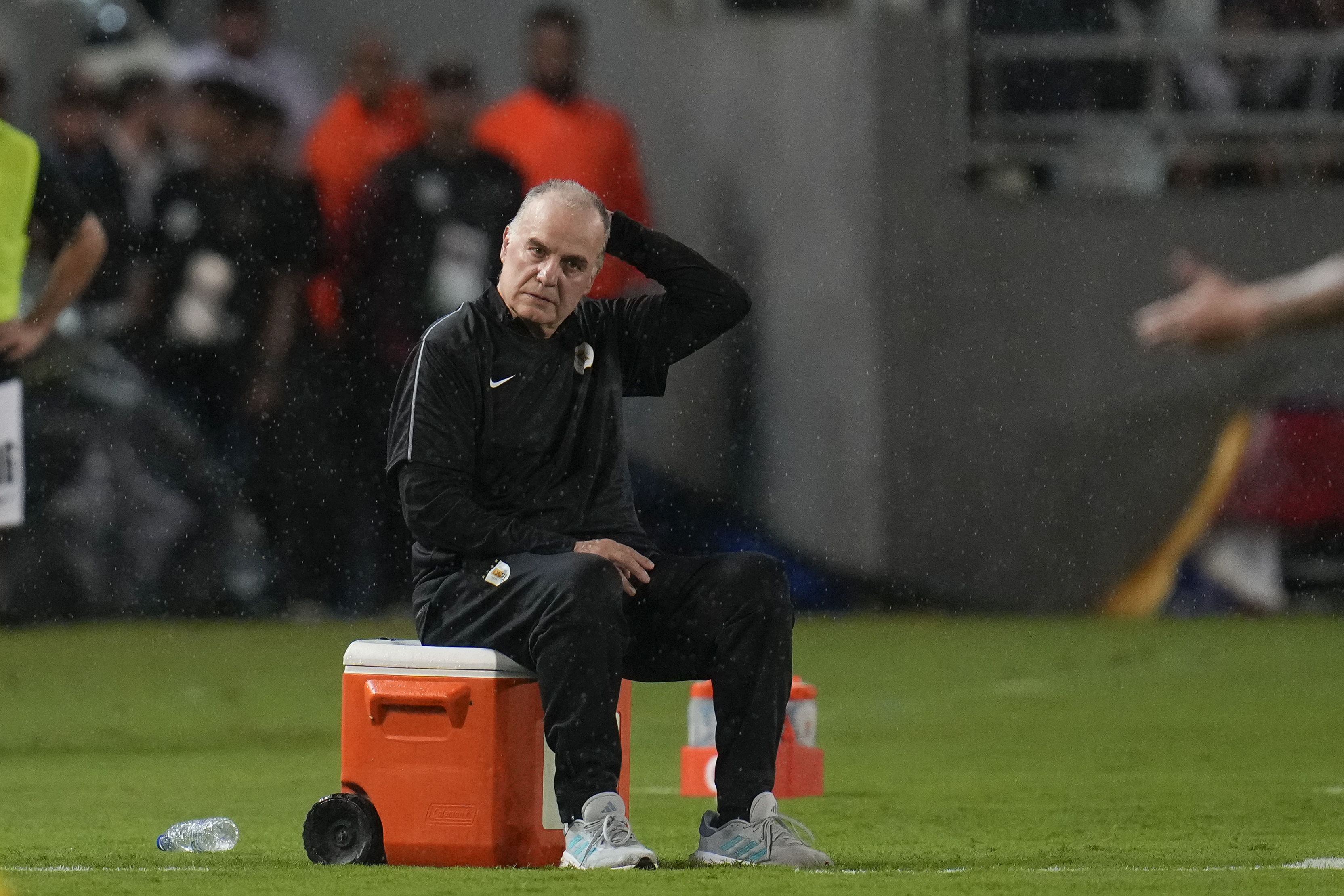 Uruguay's coach Marcelo Bielsa sits on the sidelines during a qualifying soccer match for the FIFA World Cup 2026 against Venezuela at Monumental de Maturin Stadium in Maturin, Venezuela, Tuesday, Sept. 10, 2024.