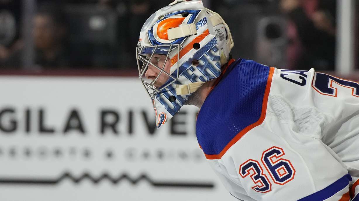 FILE - Edmonton Oilers goaltender Jack Campbell looks on in the first period of an NHL hockey game against the Arizona Coyotes, March 27, 2023, in Tempe, Ariz.