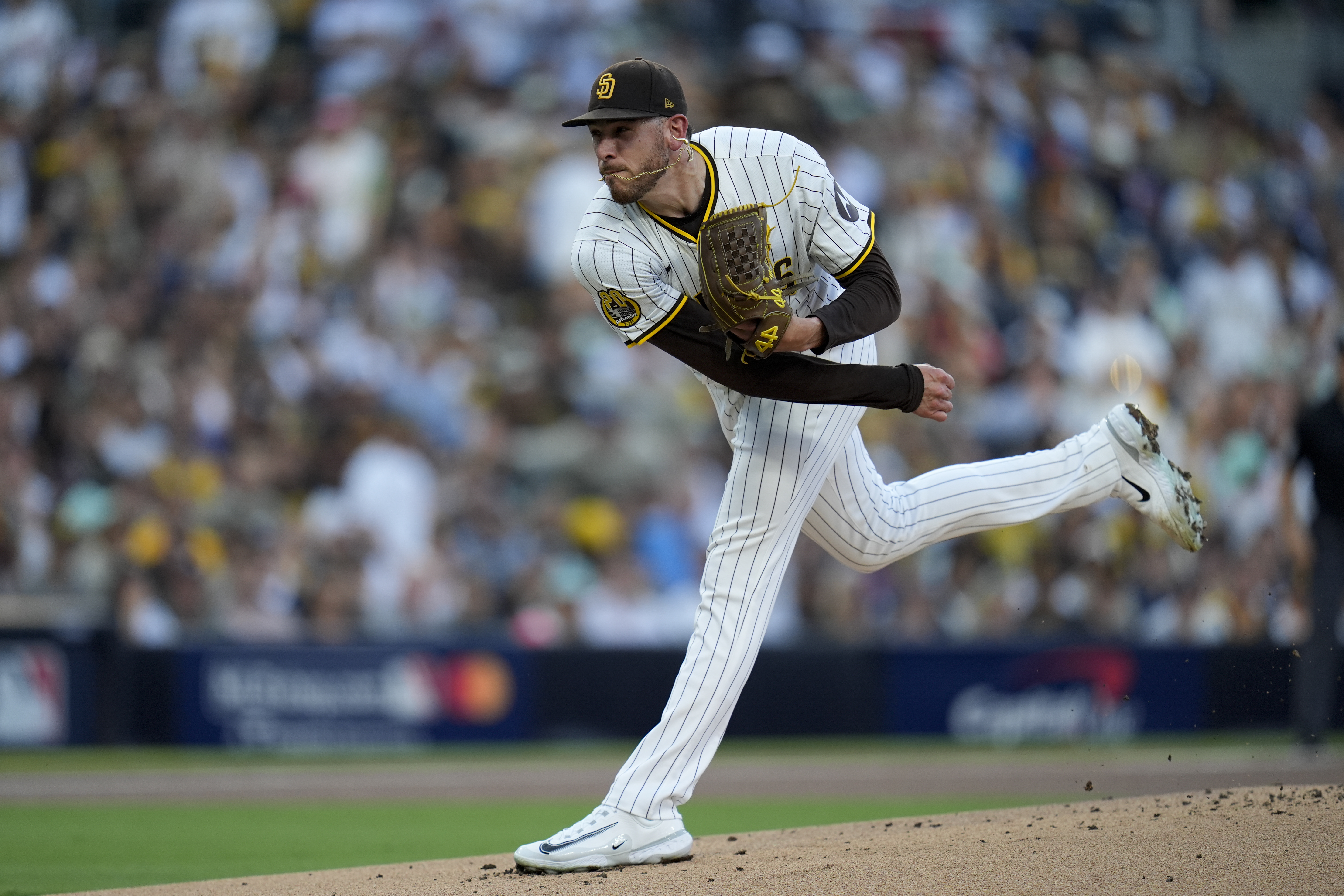 San Diego Padres starting pitcher Joe Musgrove throws to an Atlanta Braves batter during the first inning in Game 2 of an NL Wild Card Series baseball game Wednesday, Oct. 2, 2024, in San Diego.