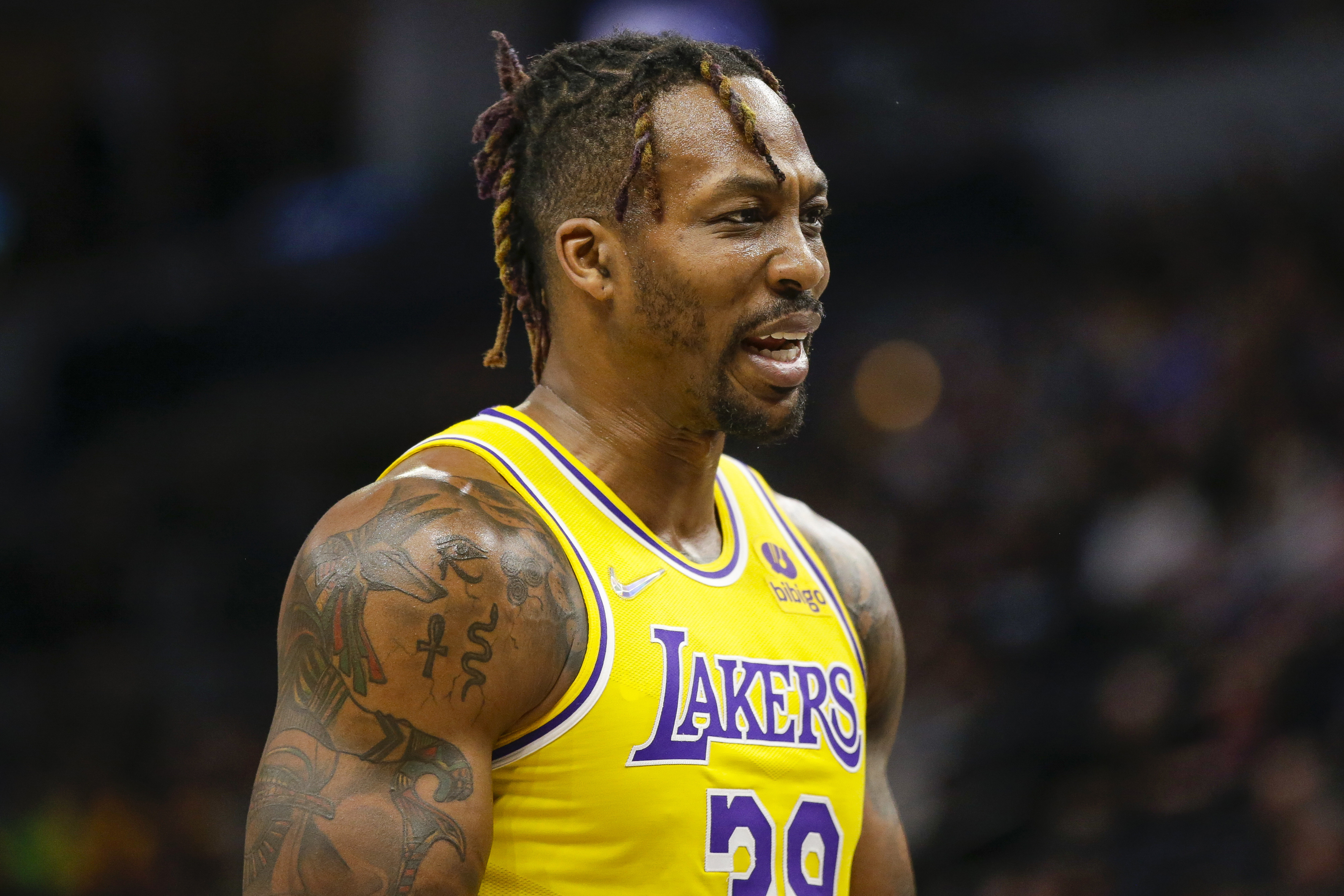 FILE - Los Angeles Lakers center Dwight Howard looks on during an NBA basketball game against the Minnesota Timberwolves, March 16, 2022, in Minneapolis.