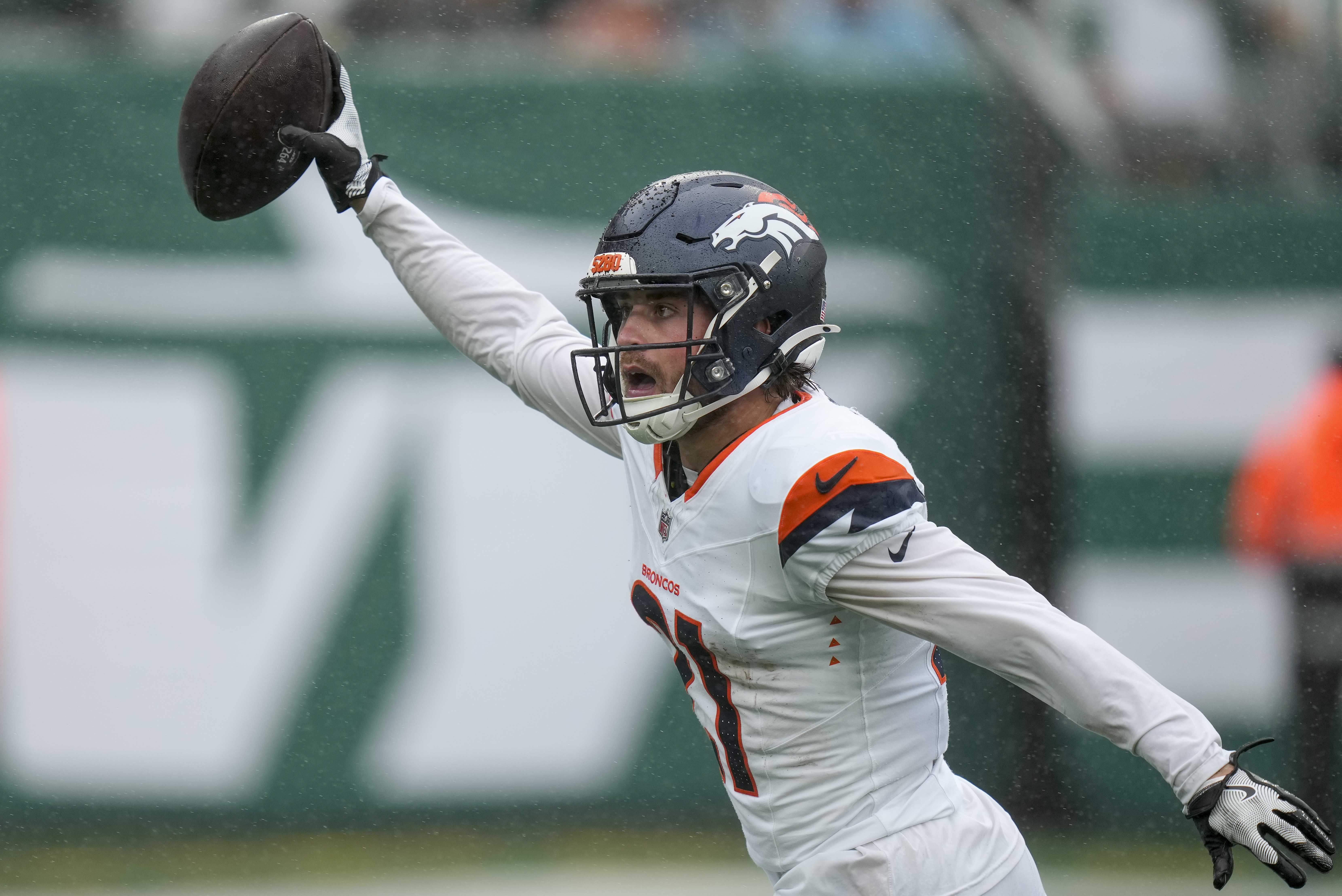 Denver Broncos cornerback Riley Moss (21) reacts after recovering a fumble by the New York Jets during the first quarter of an NFL football game, Sunday, Sept. 29, 2024, in East Rutherford, N.J.