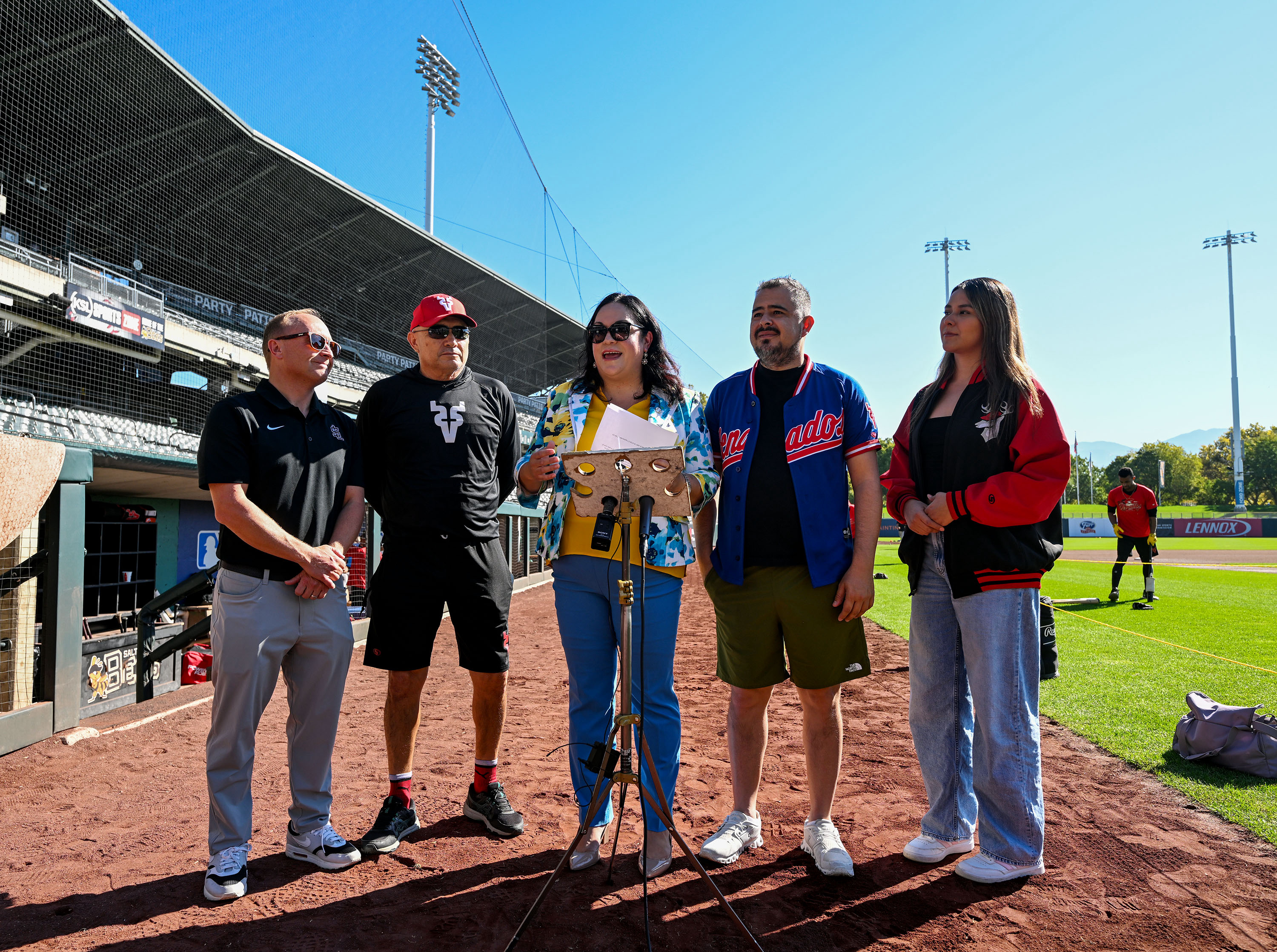 Sen. Luz Escamilla joins Dustin Dehlin, of Miller Sports, and Mahatma Millan, Jose Pacho and Genesis Jimenez, of the Venados de Mazatlán baseball team, on Friday to promote "Beisbol en Salt Lake" weekend at Smith's Ballpark.