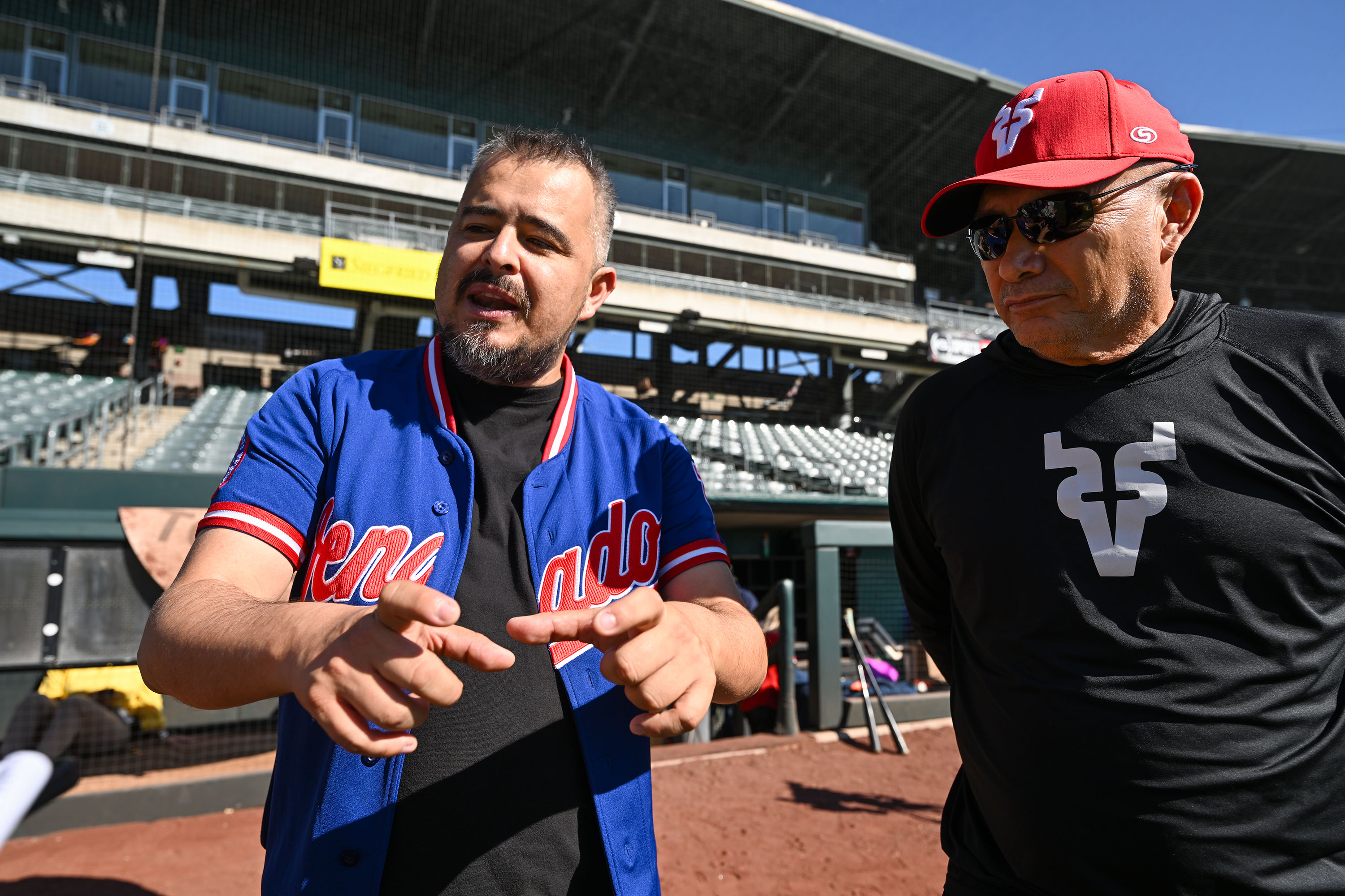 Mahatma Millan, left, who handles marketing for the Venados de Mazatlán baseball team, speaks at a press conference on Friday at Smith's Ballpark to promote "Beisbol en Salt Lake" weekend, featuring games between two Mexican teams.