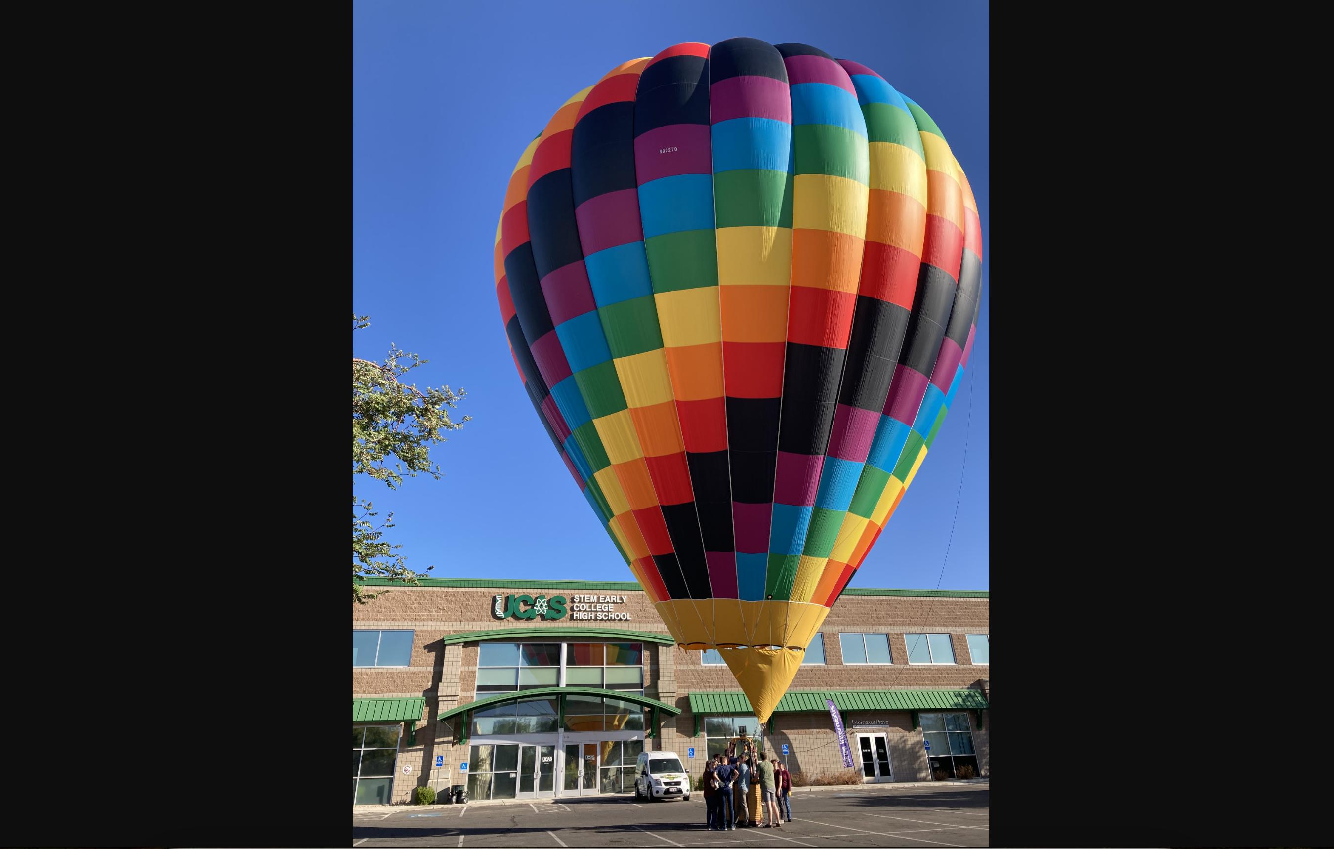 Math teacher Beverly Cannon and her students learn about hot air balloons at the Utah County Academy of Sciences in Orem.