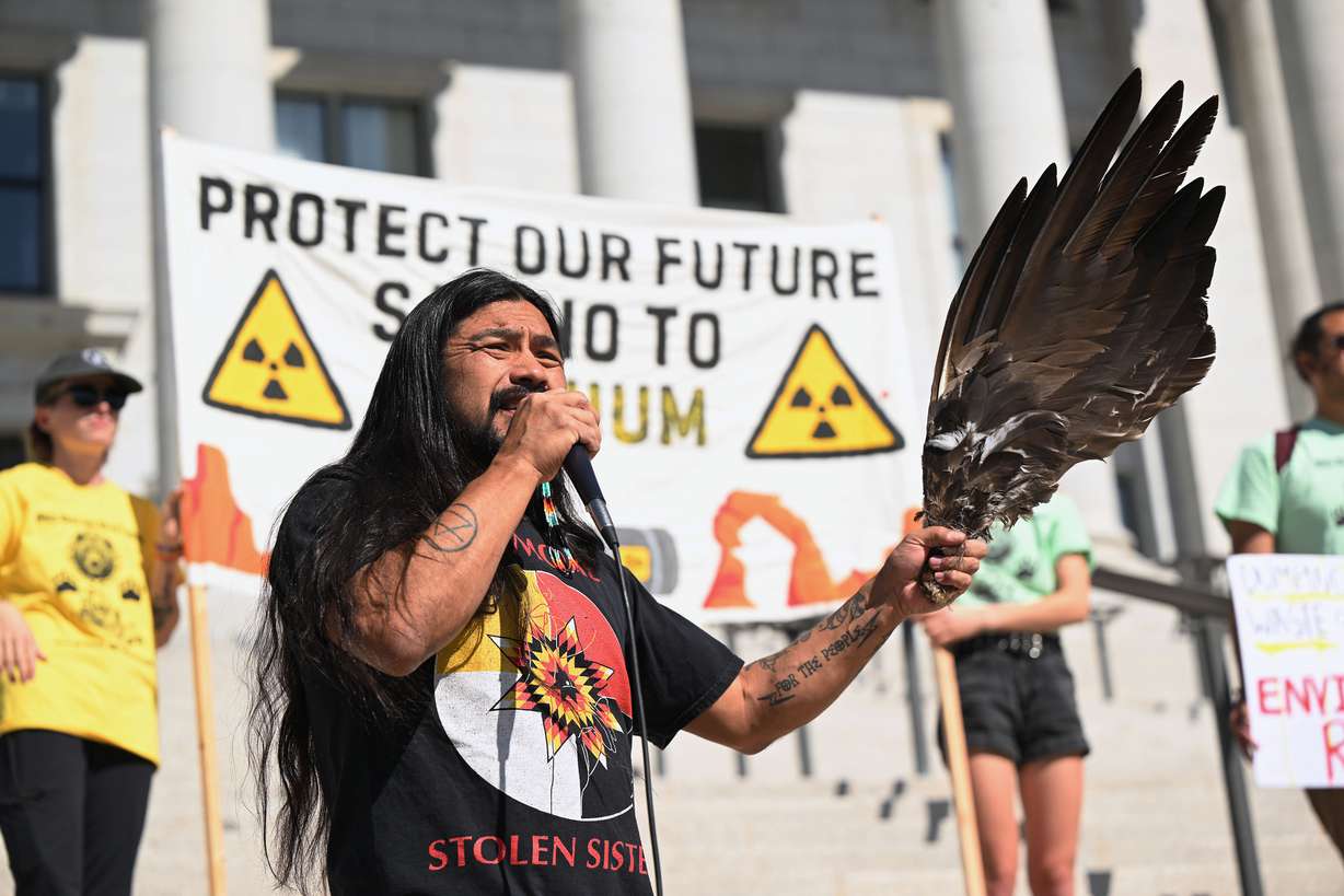 Activist Carl Moore talks before performing a blessing as members of the White Mesa Ute community rally at the Capitol in Salt Lake City to protect their health, environment and cultural heritage from Energy Fuels Resources’ White Mesa uranium mill on Friday.
