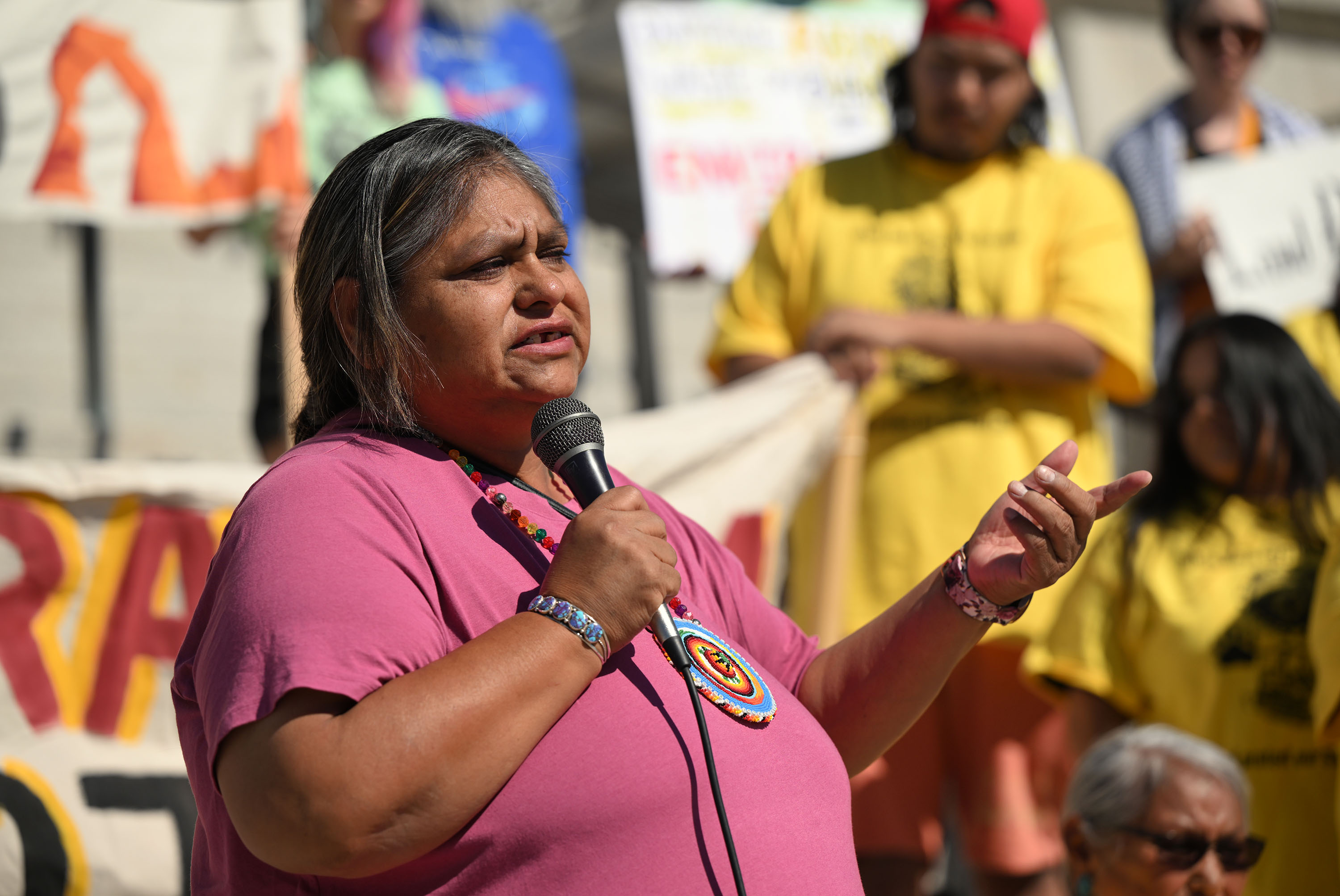 Yolanda Badback, of the White Mesa Concerned Community Protect, speaks at a rally against bringing uranium to her homelands at the Capitol on Friday.