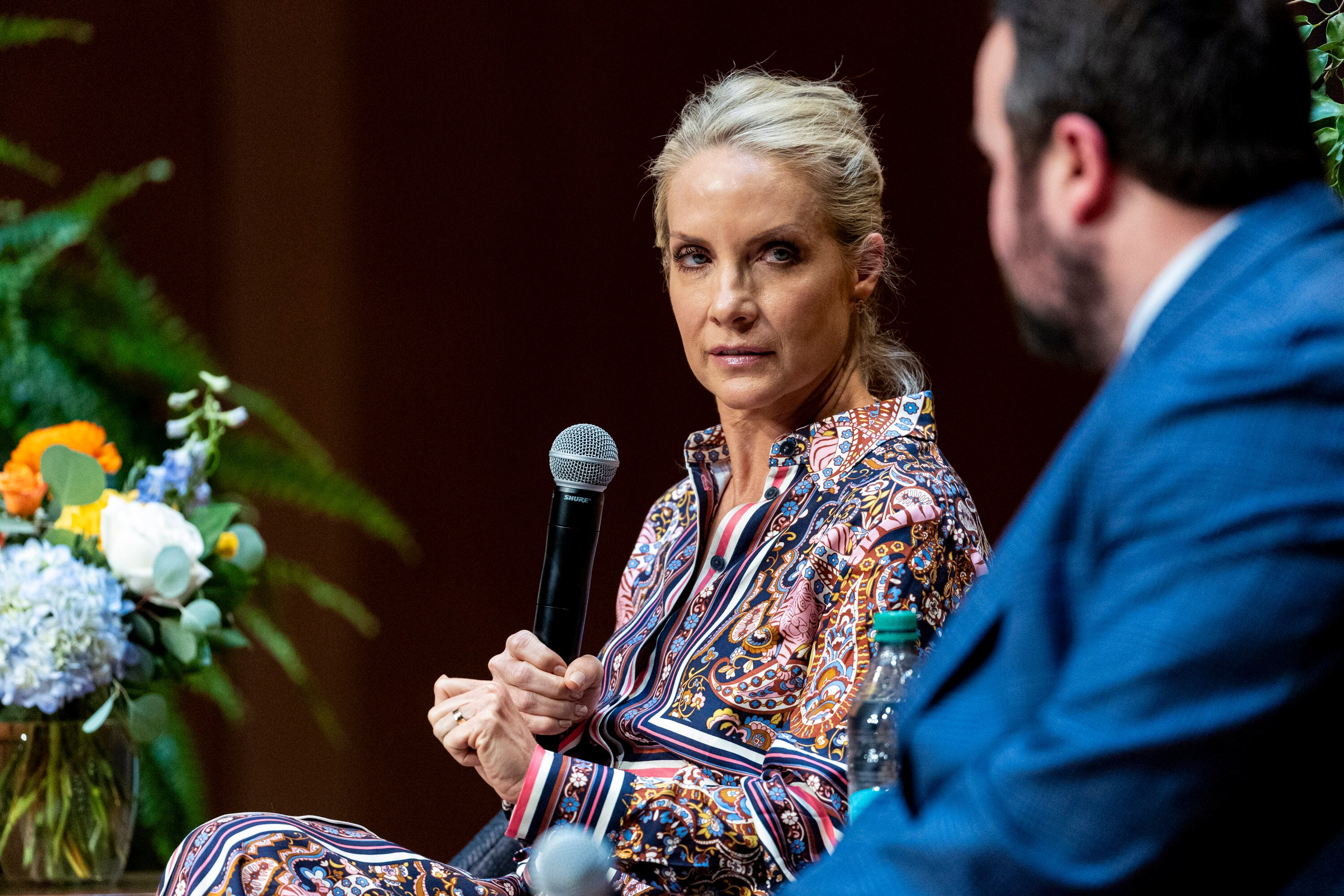 Dana Perino, Fox News anchor and host and former White House press secretary who served under President George W. Bush, looks to Matt Whitlock, former spokesman for Sen. Orrin Hatch, R-Utah, as she speaks during a symposium titled “Freedom of Speech: Improving Civil Dialogue on College Campuses” at the Caine Performance Hall on the campus of Utah State University in Logan on Friday.