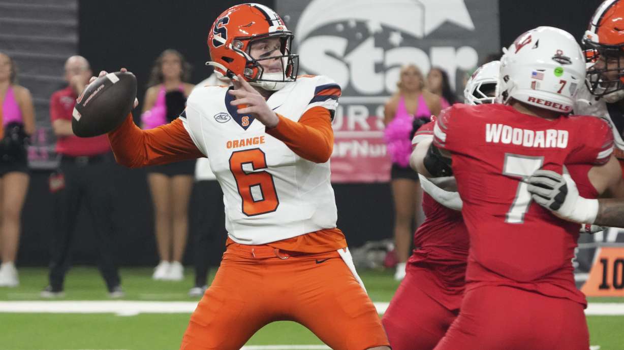 Syracuse quarterback Kyle McCord (6) looks to throw downfield against UNLV in the first half during an NCAA college football game, Friday, Oct. 4, 2024, in Las Vegas.