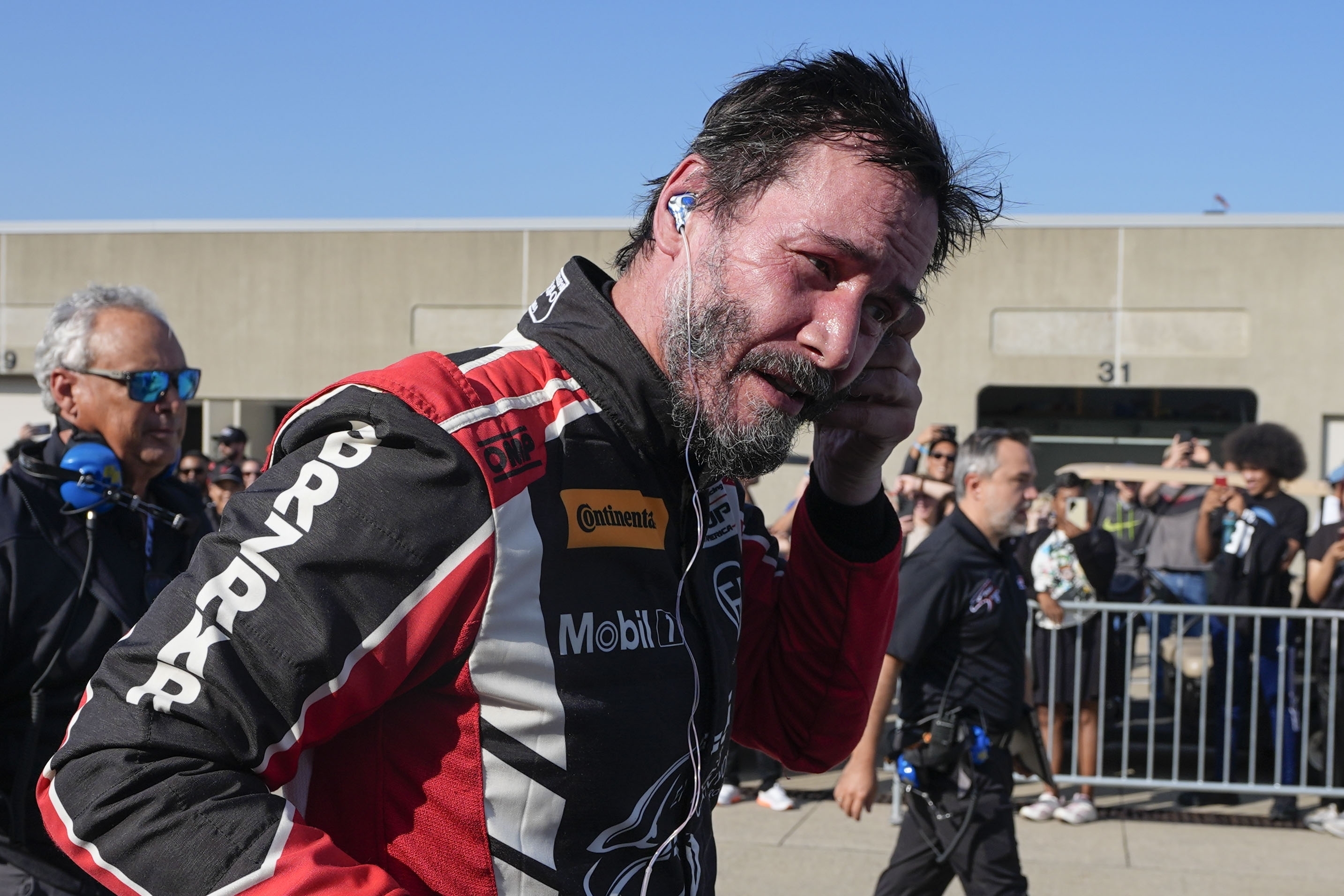 Keanu Reeves spins out at Indianapolis Motor Speedway in pro auto racing debut