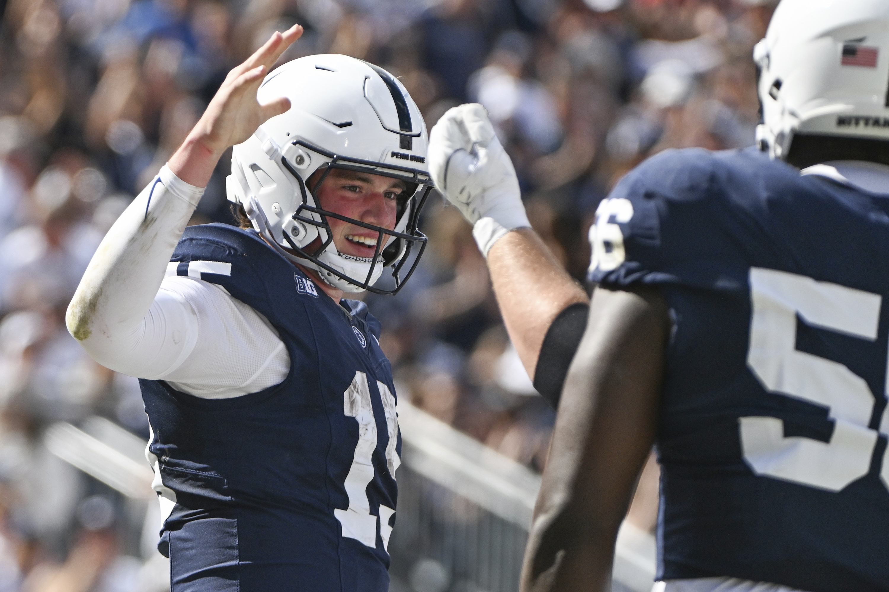 Penn State quarterback Drew Allar (15) celebrates a touchdown during the first half of an NCAA college football game against UCLA Saturday, Oct. 5, 2024, in State College, Pa.