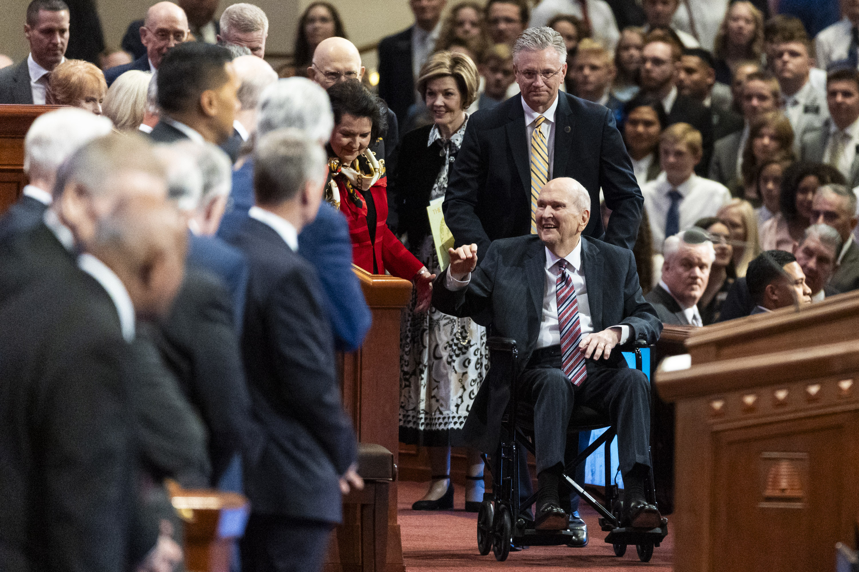 President Russell M. Nelson of The Church of Jesus Christ of Latter-day Saints enters the afternoon session of the 194th Semiannual General Conference of The Church of Jesus Christ of Latter-day Saints on Saturday.