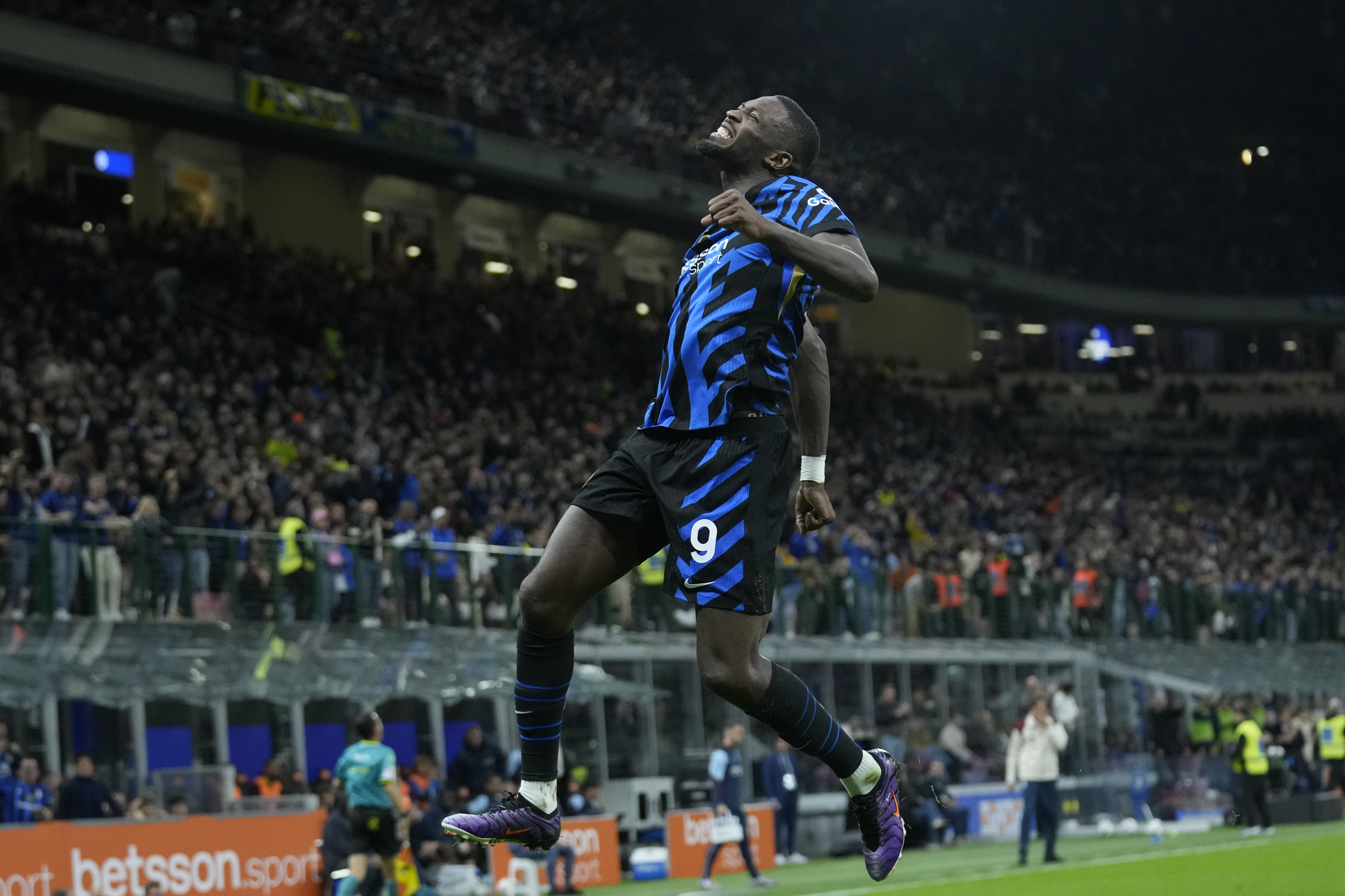 Inter Milan's Marcus Thuram celebrates scoring his side's opening goal during the Serie A soccer match between Inter Milan and Torino at the San Siro Stadium, in Milan, Italy, Saturday, Oct. 5, 2024.