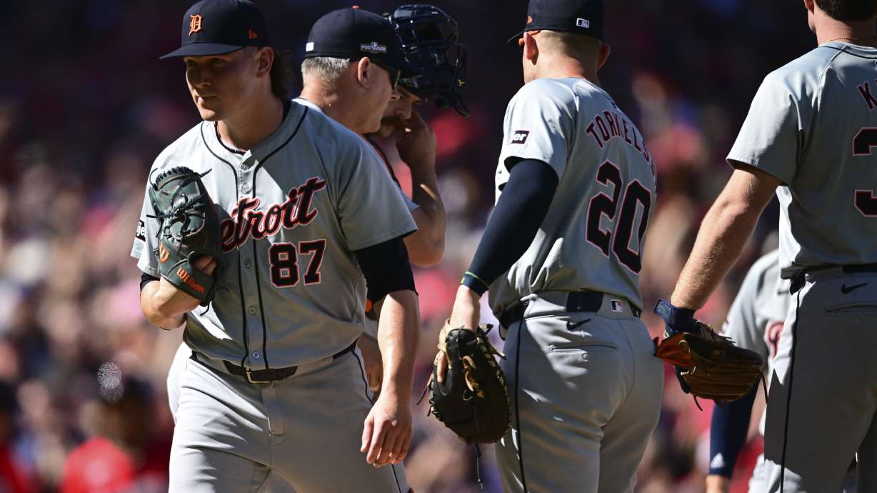 Detroit Tigers relief pitcher Tyler Holton (87) is taken out of the game in the first inning during Game 1 of baseball's AL Division Series against the Cleveland Guardians, Saturday, Oct. 5, 2024, in Cleveland.